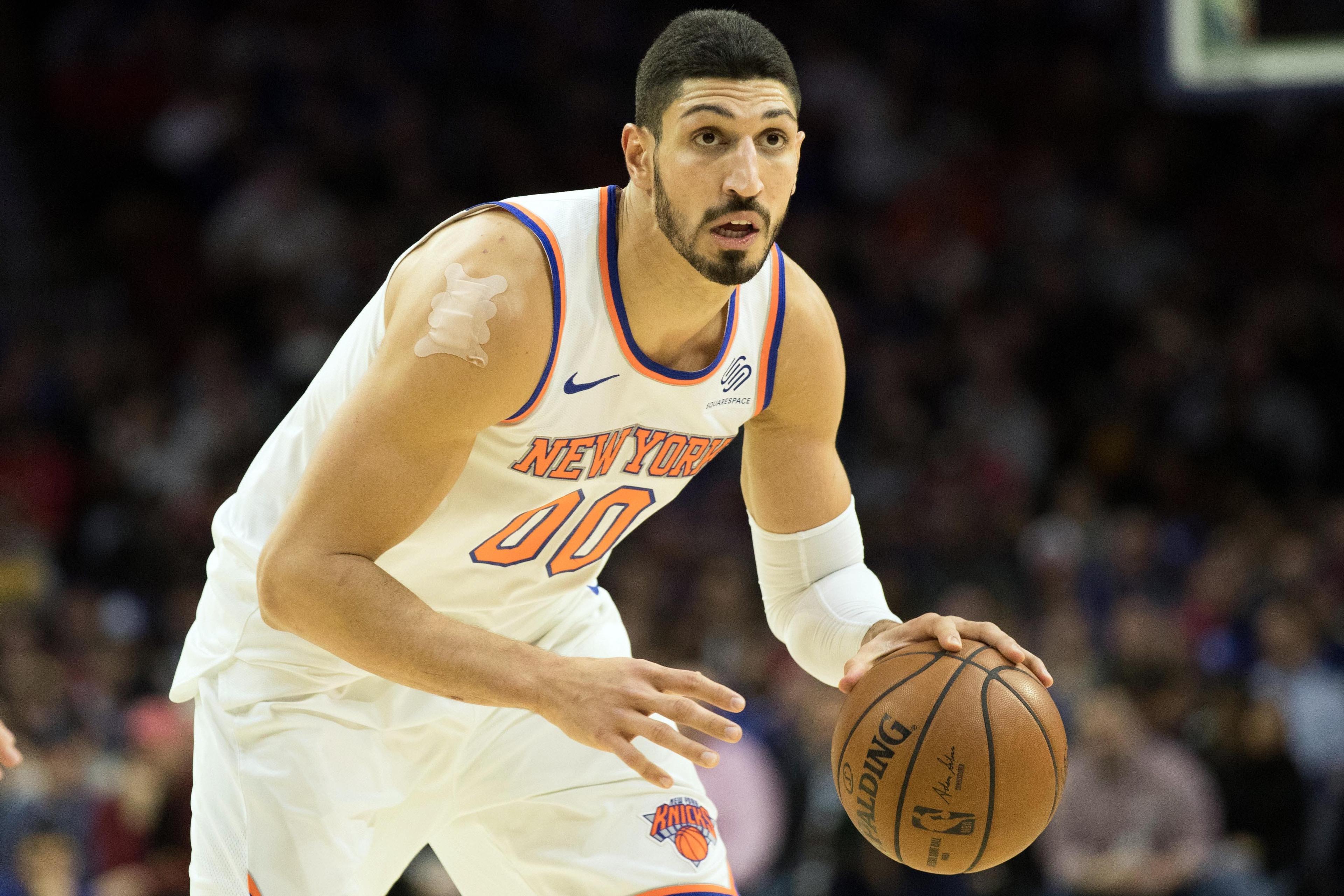 Dec 19, 2018; Philadelphia, PA, USA; New York Knicks center Enes Kanter (00) dribbles against the Philadelphia 76ers during the second quarter at Wells Fargo Center. Mandatory Credit: Bill Streicher-USA TODAY Sports / Bill Streicher