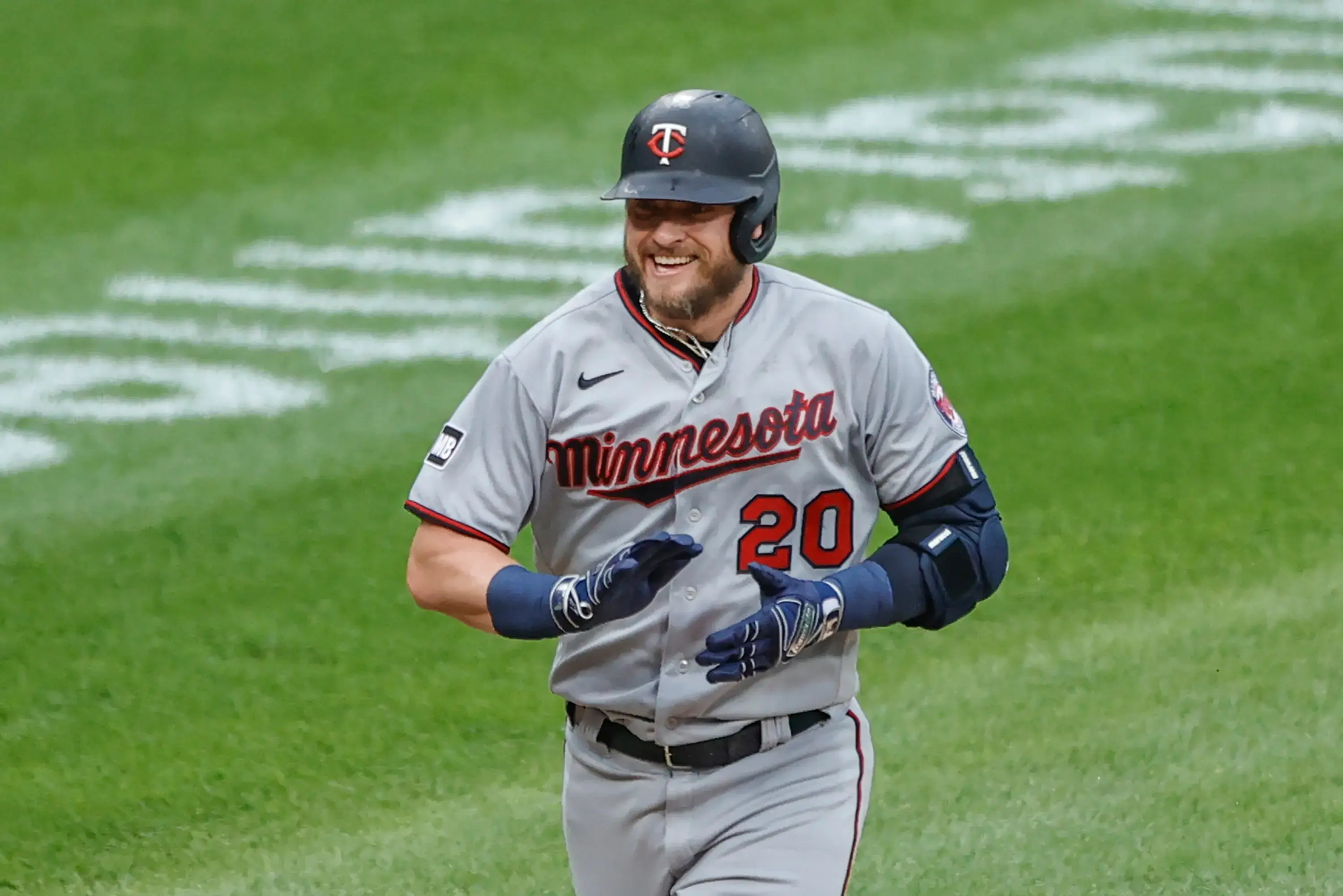 Jun 29, 2021; Chicago, Illinois, USA; Minnesota Twins third baseman Josh Donaldson (20) smiles as he rounds the bases after hitting a two run home run against the Chicago White Sox during the first inning at Guaranteed Rate Field. / Kamil Krzaczynski-USA TODAY Sports