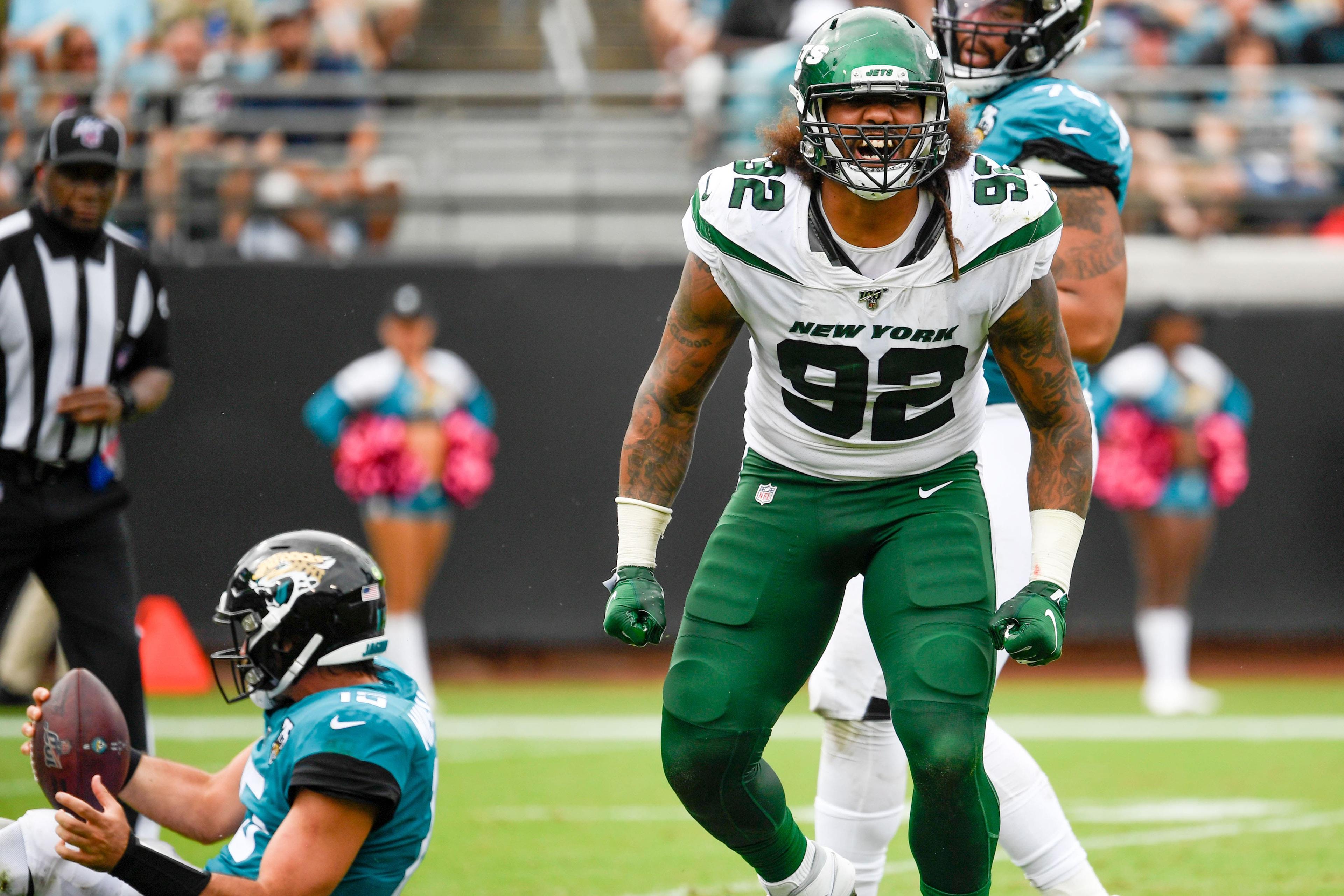 Oct 27, 2019; Jacksonville, FL, USA; New York Jets defensive end Leonard Williams (92) reacts after sacking Jacksonville Jaguars quarterback Gardner Minshew (15) during the third quarter at TIAA Bank Field. Mandatory Credit: Douglas DeFelice-USA TODAY Sports / Douglas DeFelice