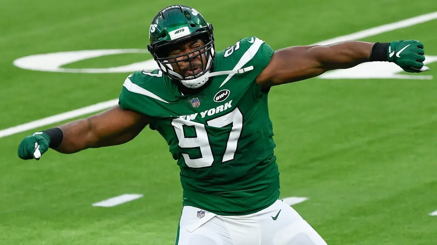 Dec 18, 2020; Los Angeles, California, USA; New York Jets defensive end Nathan Shepherd (97) celebrates dropping Los Angeles Rams quarterback Jared Goff (not pictured) for a loss during the second quarter at SoFi Stadium. / Robert Hanashiro-USA TODAY Sports