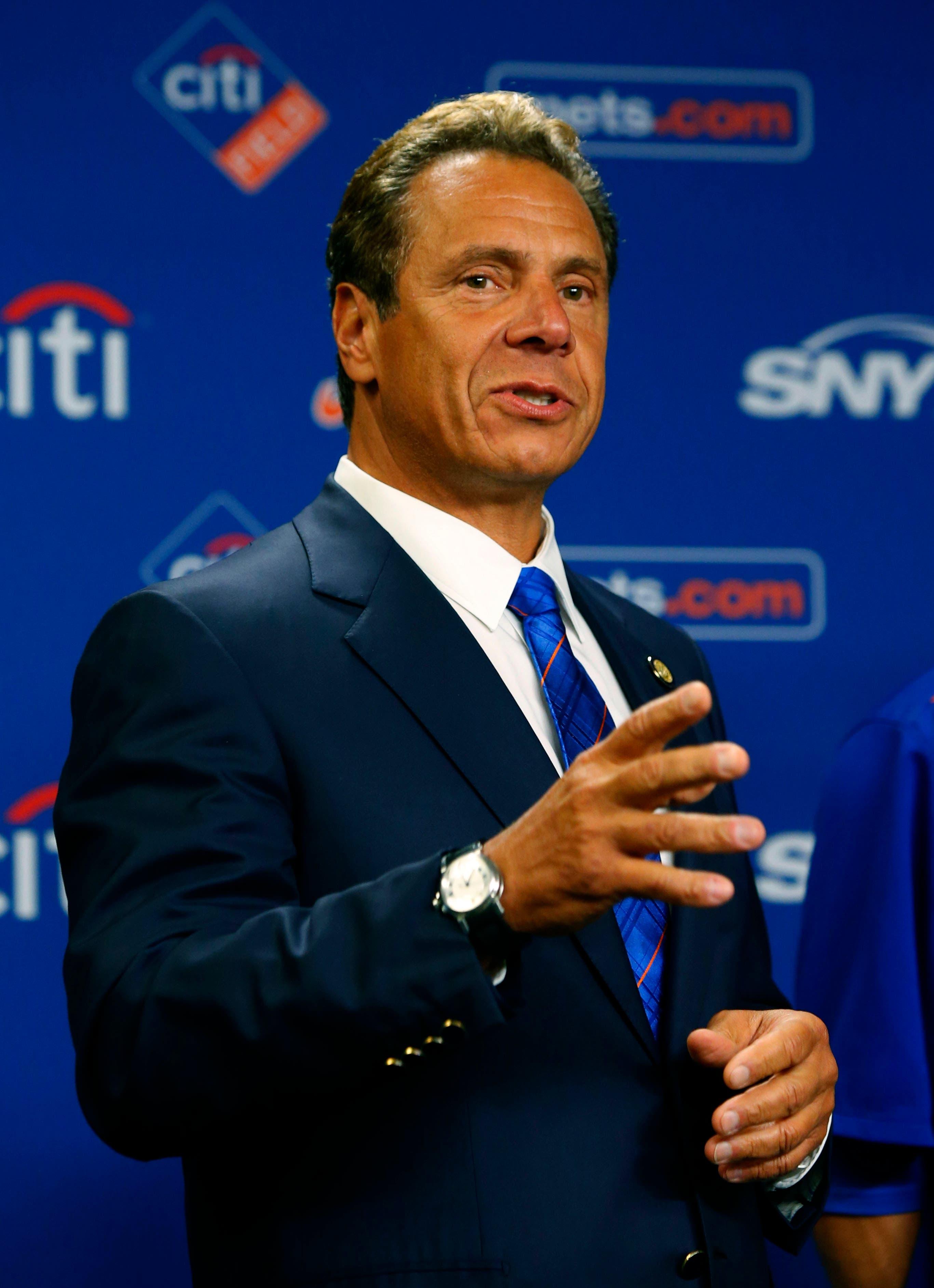 Aug 31, 2016; New York City, NY, USA; New York Gov. Andrew Cuomo speaks to members of the New York Little League championship team during a press conference before a New York Mets game against the Miami Marlins at Citi Field. Mandatory Credit: Noah K. Murray-USA TODAY Sports / Noah K. Murray