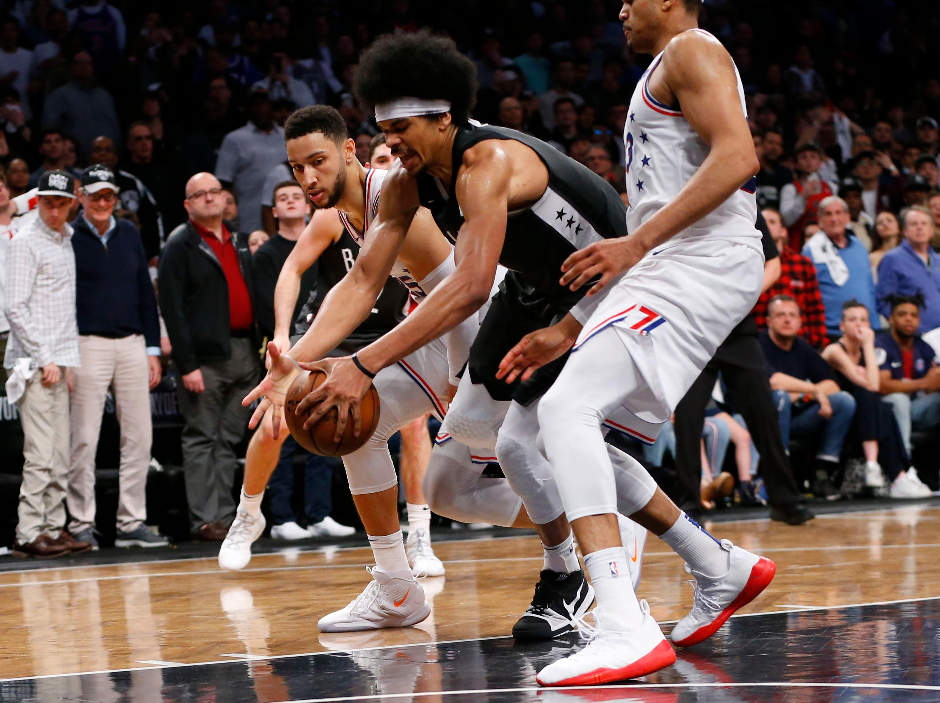 Apr 20, 2019; Brooklyn, NY, USA; Brooklyn Nets center Jarrett Allen (31) loses the ball against Philadelphia 76ers defender during the second half at Barclays Center. Mandatory Credit: Noah K. Murray-USA TODAY Sports