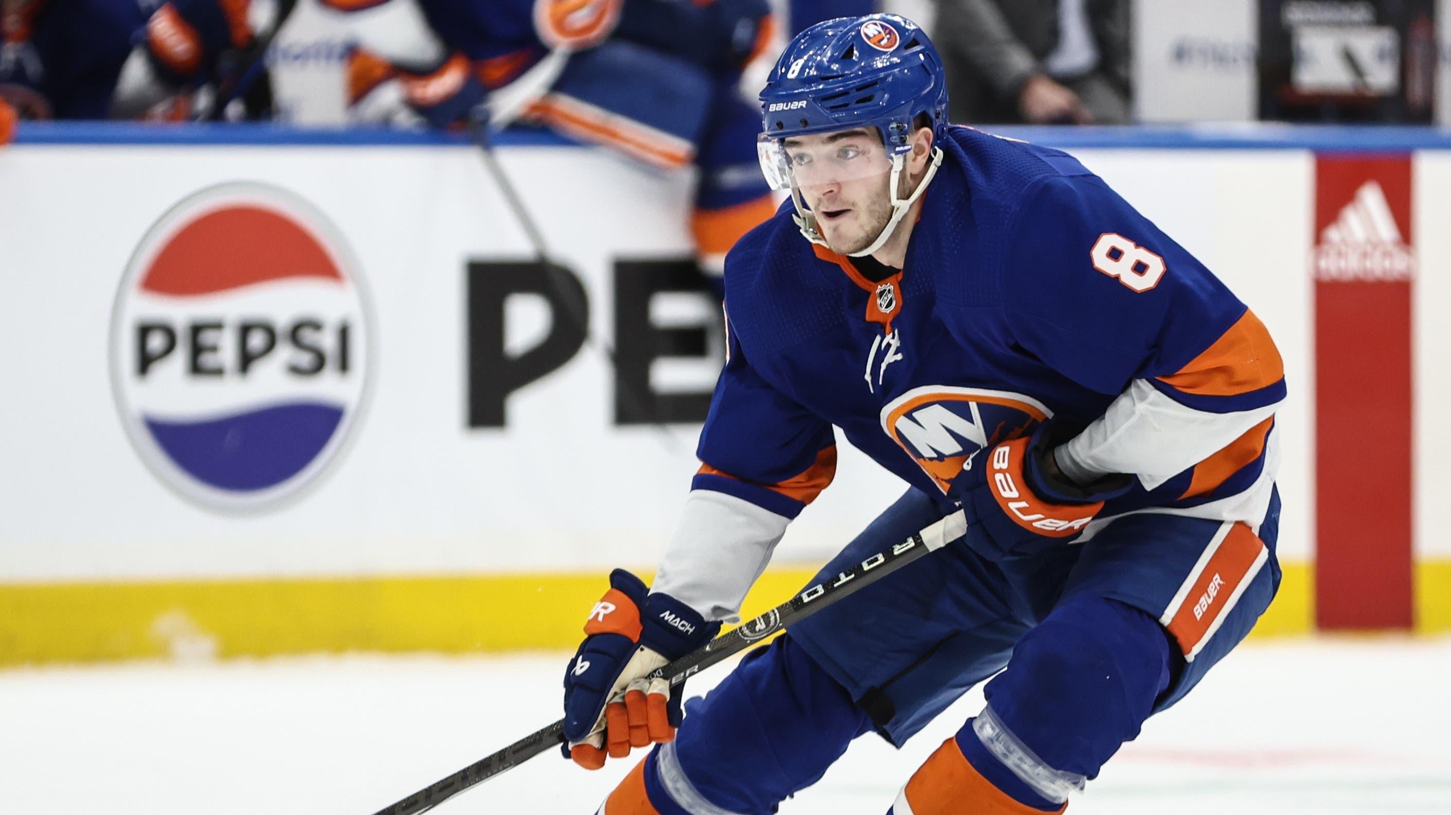 New York Islanders defenseman Noah Dobson (8) controls the puck in the second period against the Carolina Hurricanes in game four of the first round of the 2024 Stanley Cup Playoffs at UBS Arena / Wendell Cruz - Imagn Images