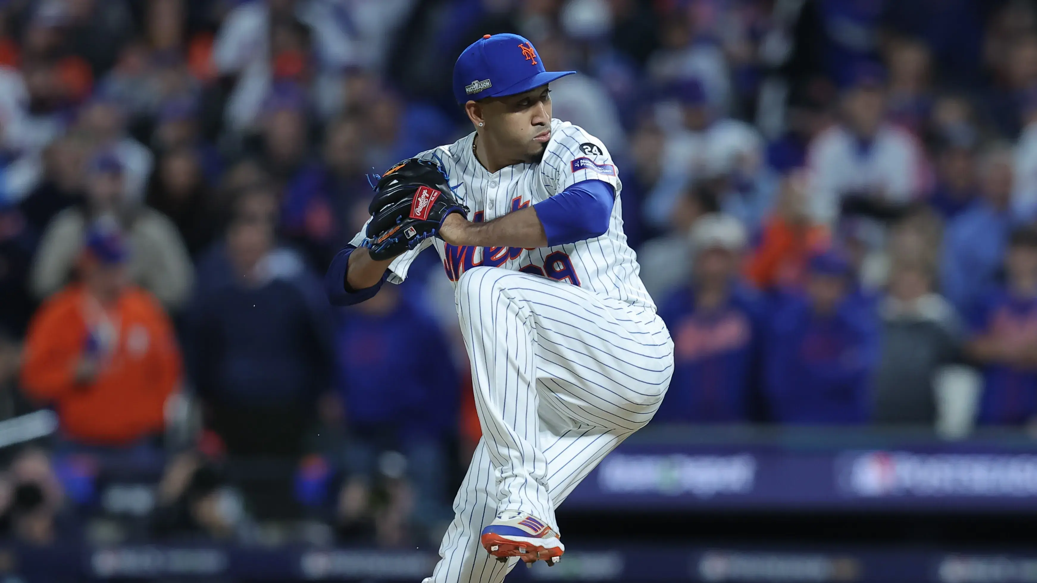 Oct 18, 2024; New York City, New York, USA; New York Mets relief pitcher Edwin Díaz (39) pitches in the eighth inning against the Los Angeles Dodgers during game five of the NLCS for the 2024 MLB playoffs at Citi Field. Mandatory Credit: Brad Penner-Imagn Images / © Brad Penner-Imagn Images