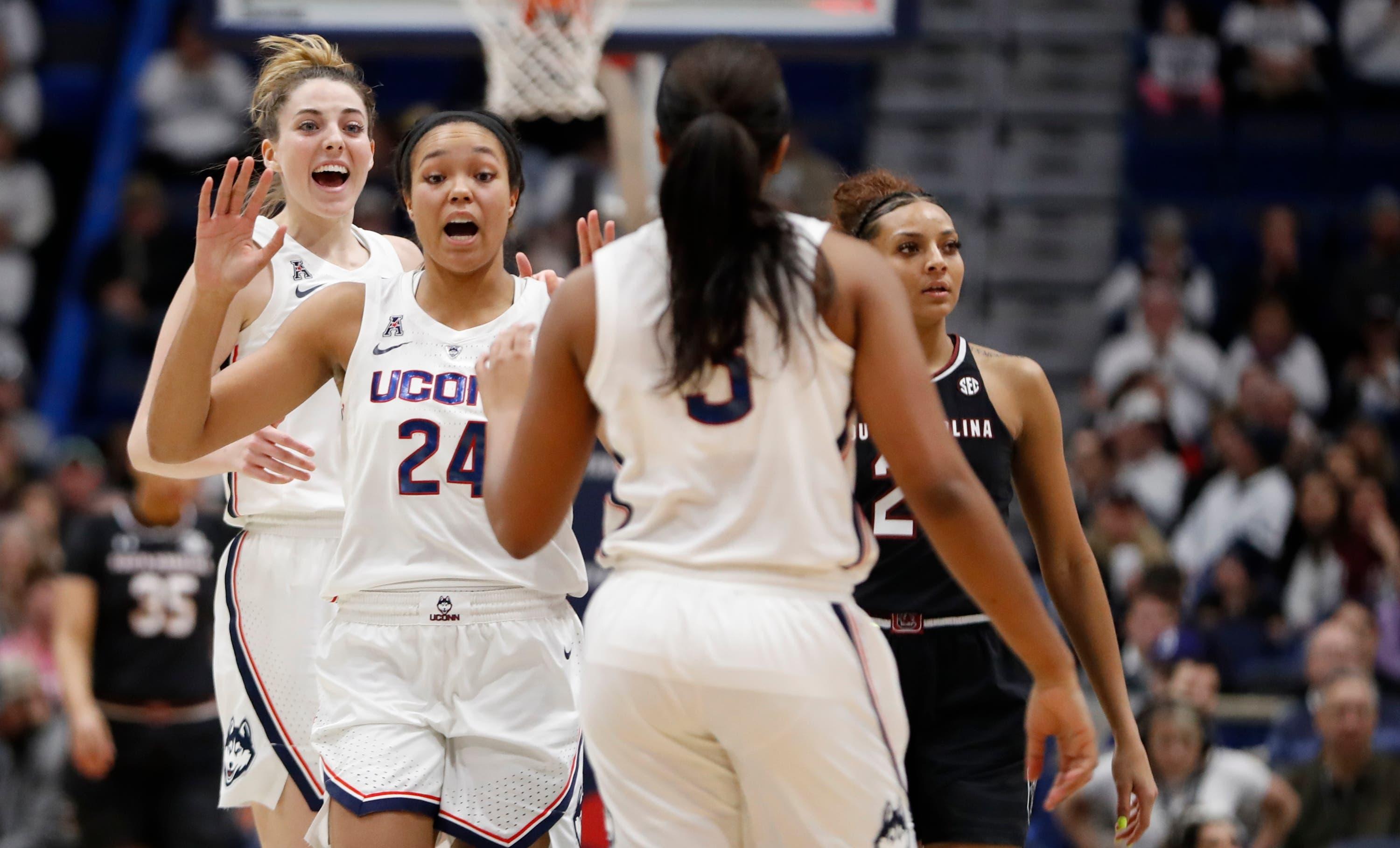 Connecticut Huskies guard/forward Katie Lou Samuelson and forward Napheesa Collier react after a play against the South Carolina Gamecocks in the second half at XL Center / David Butler II/USA TODAY Sports