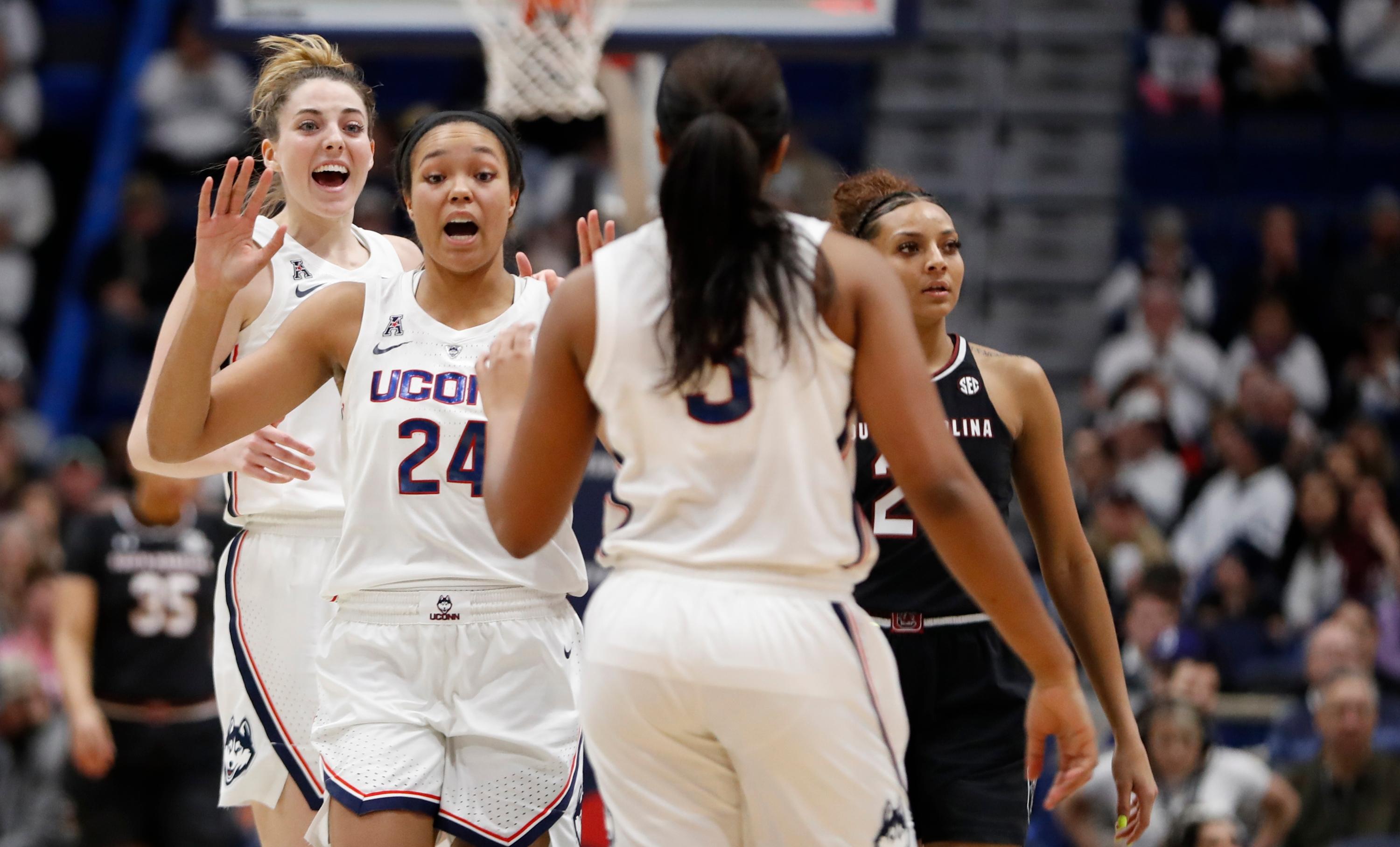 Connecticut Huskies guard/forward Katie Lou Samuelson and forward Napheesa Collier react after a play against the South Carolina Gamecocks in the second half at XL Center