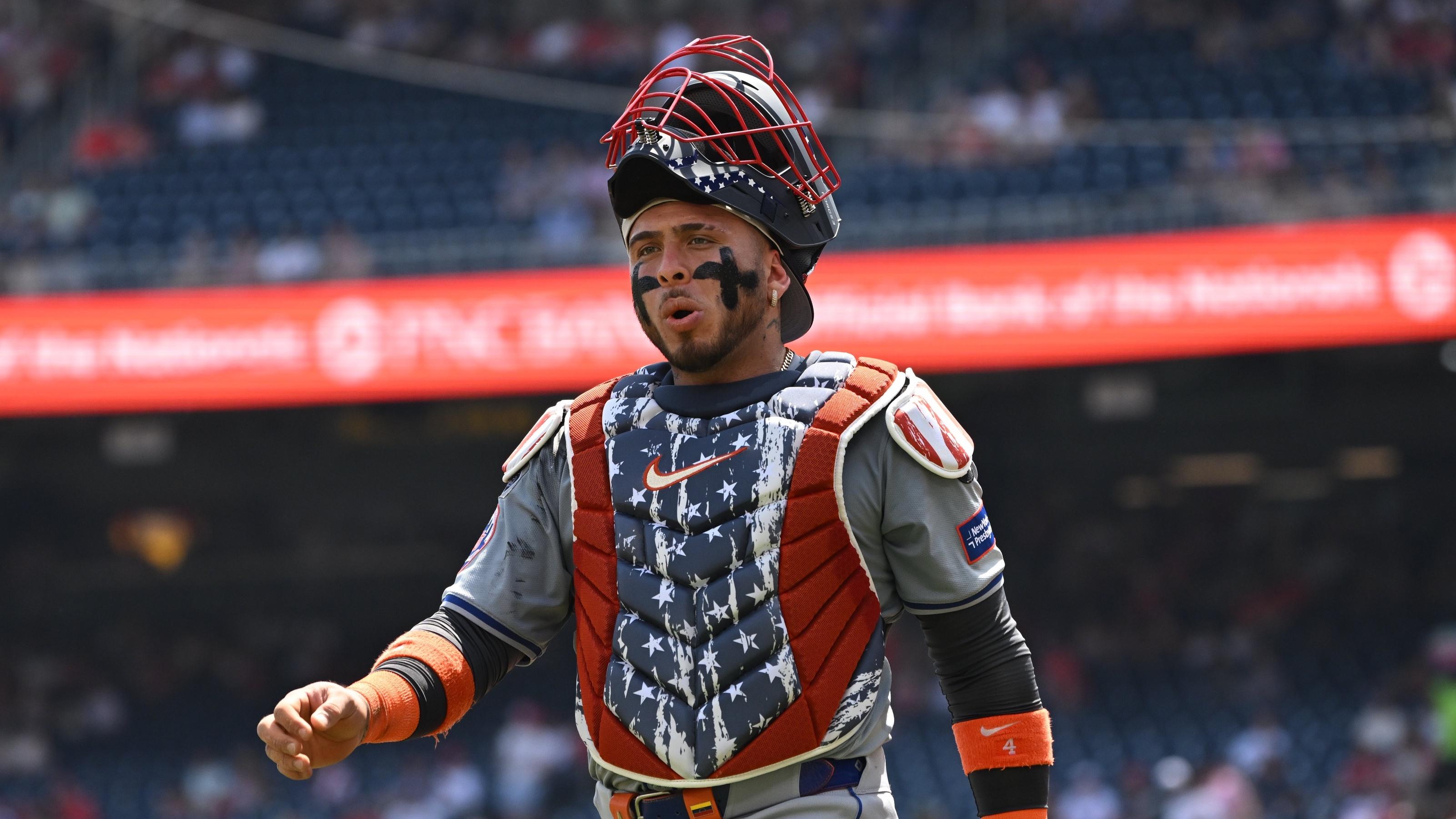 New York Mets catcher Francisco Alvarez (4) wears a 4th of July themed catchers kit against the Washington Nationals during the first inning at Nationals Park.