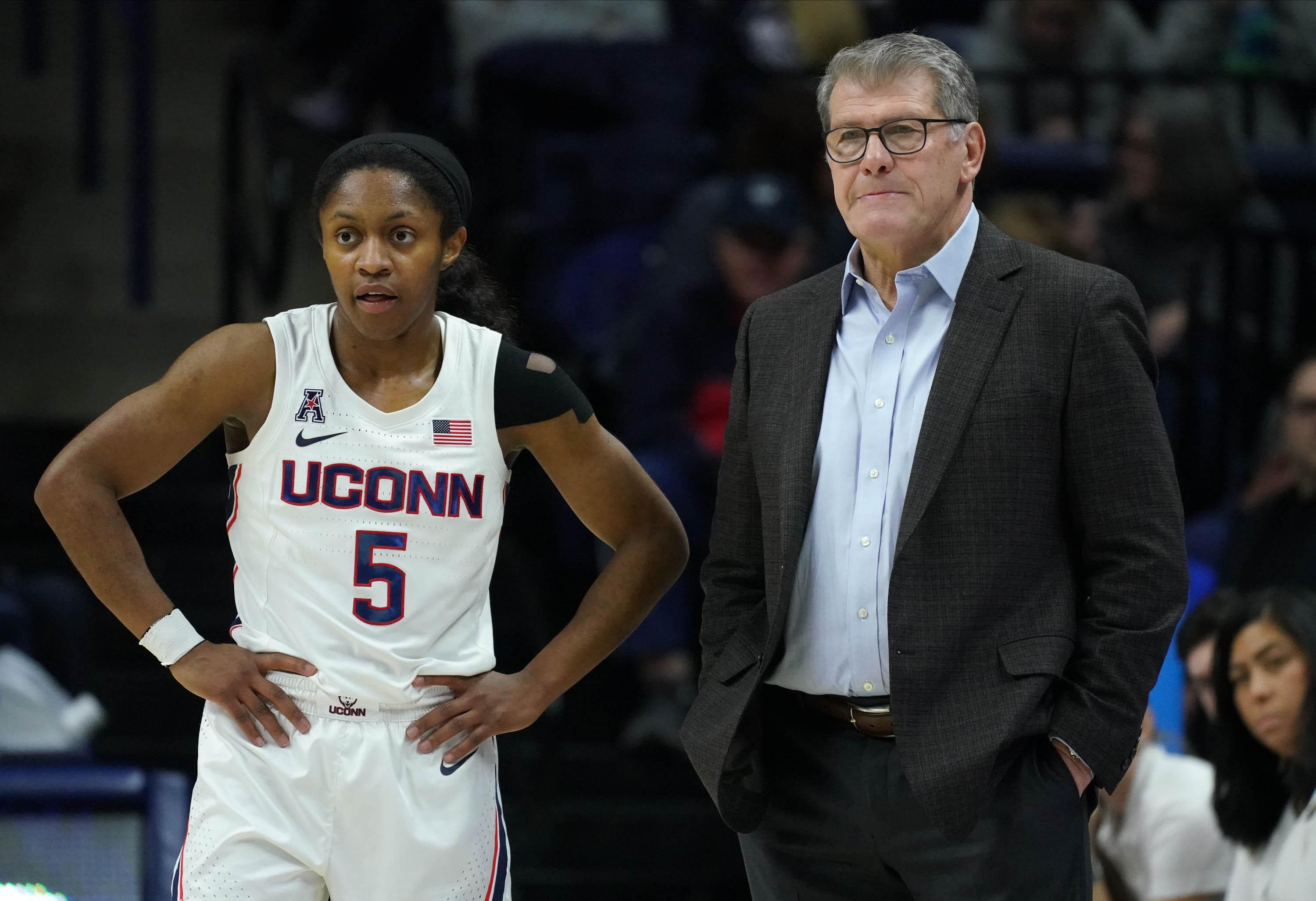 Jan 30, 2020; Storrs, Connecticut, USA; UConn Huskies head coach Geno Auriemma and guard Crystal Dangerfield (5) on the sideline as they take on the Cincinnati Bearcats in the second half at Harry A. Gampel Pavilion. UConn defeated Cincinnati 80-50. Mandatory Credit: David Butler II-USA TODAY Sports