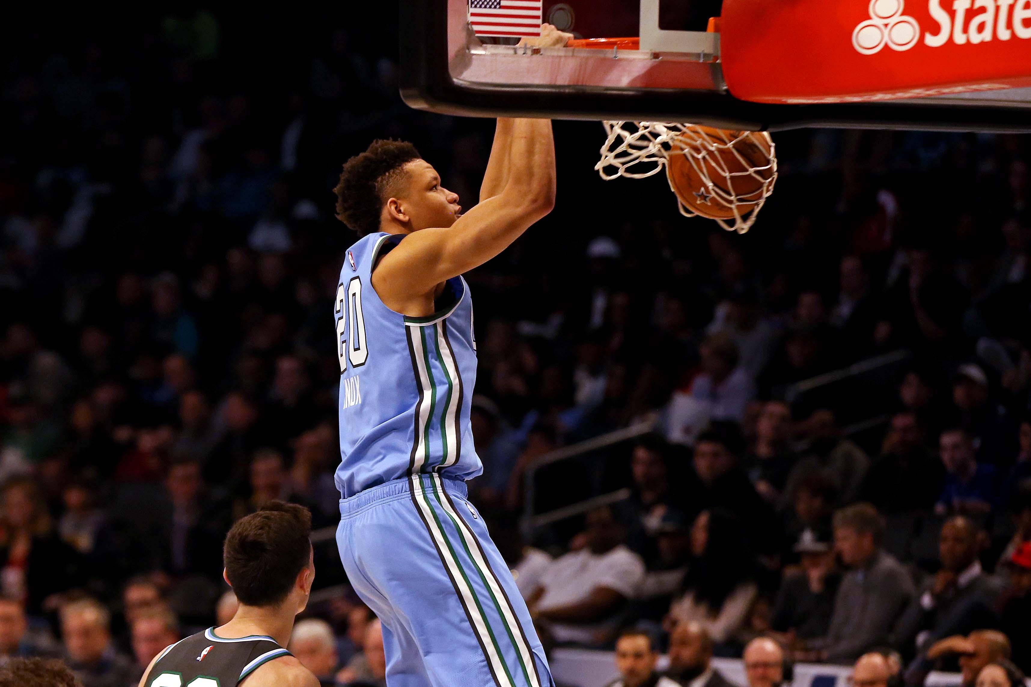 Feb 15, 2019; Charlotte, NC, USA; U.S. Team forward Kevin Knox of the New York Knicks dunks the ball against World Team forward Rodions Kurucs of the Brooklyn Nets during the All-Star Rising Stars game at Spectrum Center. Mandatory Credit: Bob Donnan-USA TODAY Sports / Bob Donnan