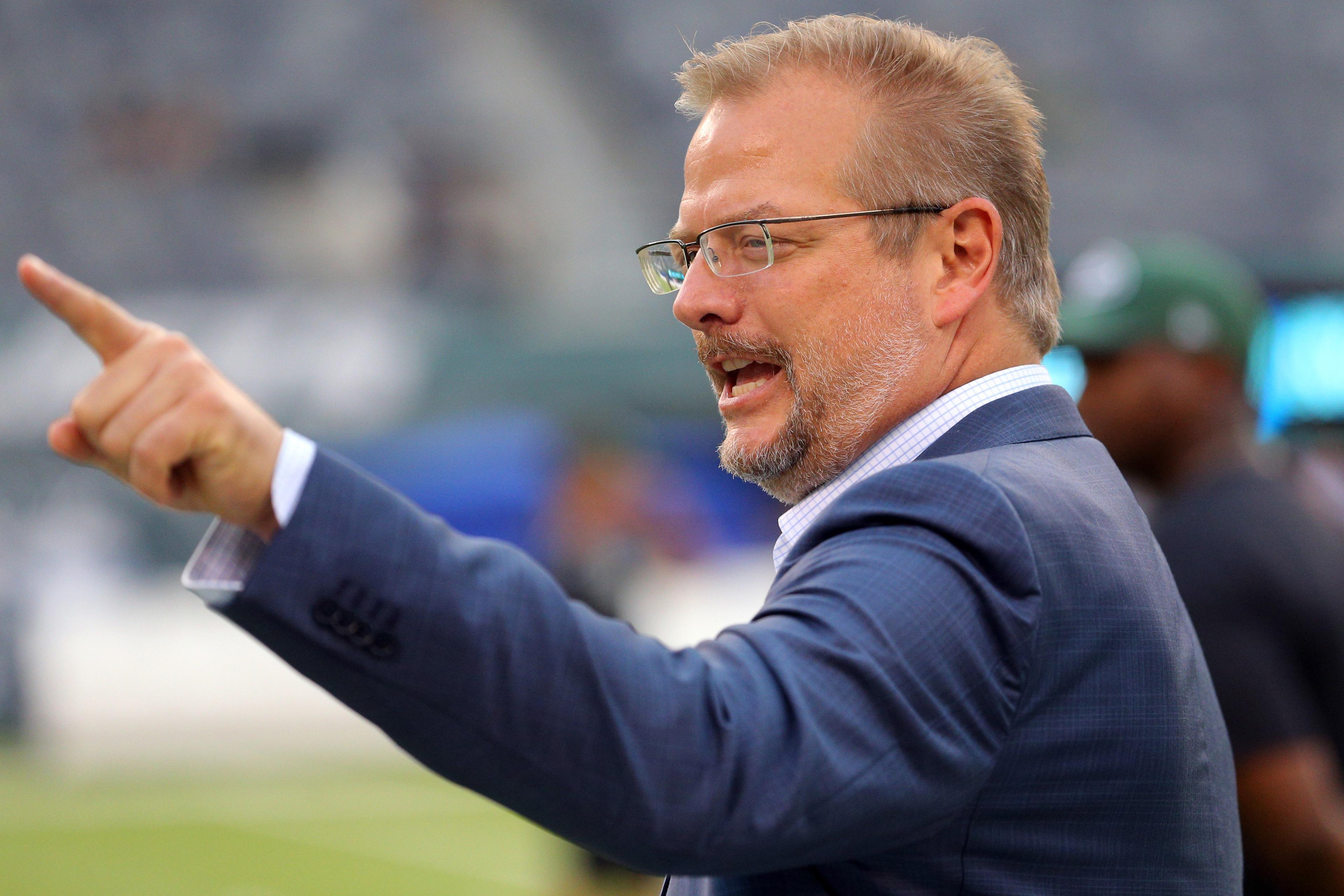 Aug 12, 2017; East Rutherford, NJ, USA; New York Jets general manager Mike Maccagnan reacts on the field before a preseason game against the Tennessee Titans at MetLife Stadium. Mandatory Credit: Brad Penner-USA TODAY Sports