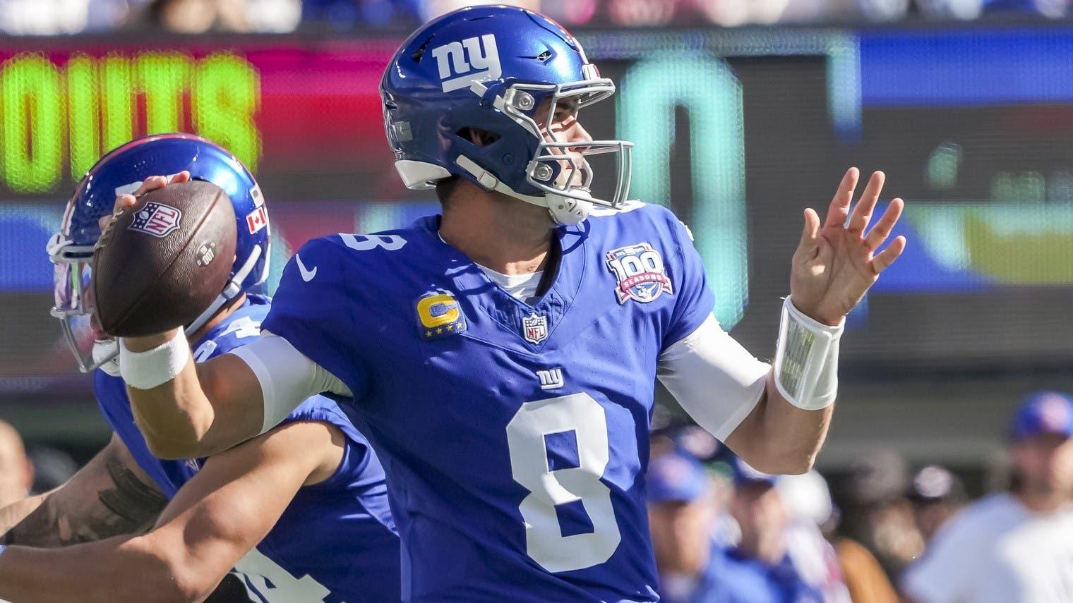 Oct 20, 2024; East Rutherford, New Jersey, USA; New York Giants quarterback Daniel Jones (8) against the Philadelphia Eagles during the first quarter at MetLife Stadium. 