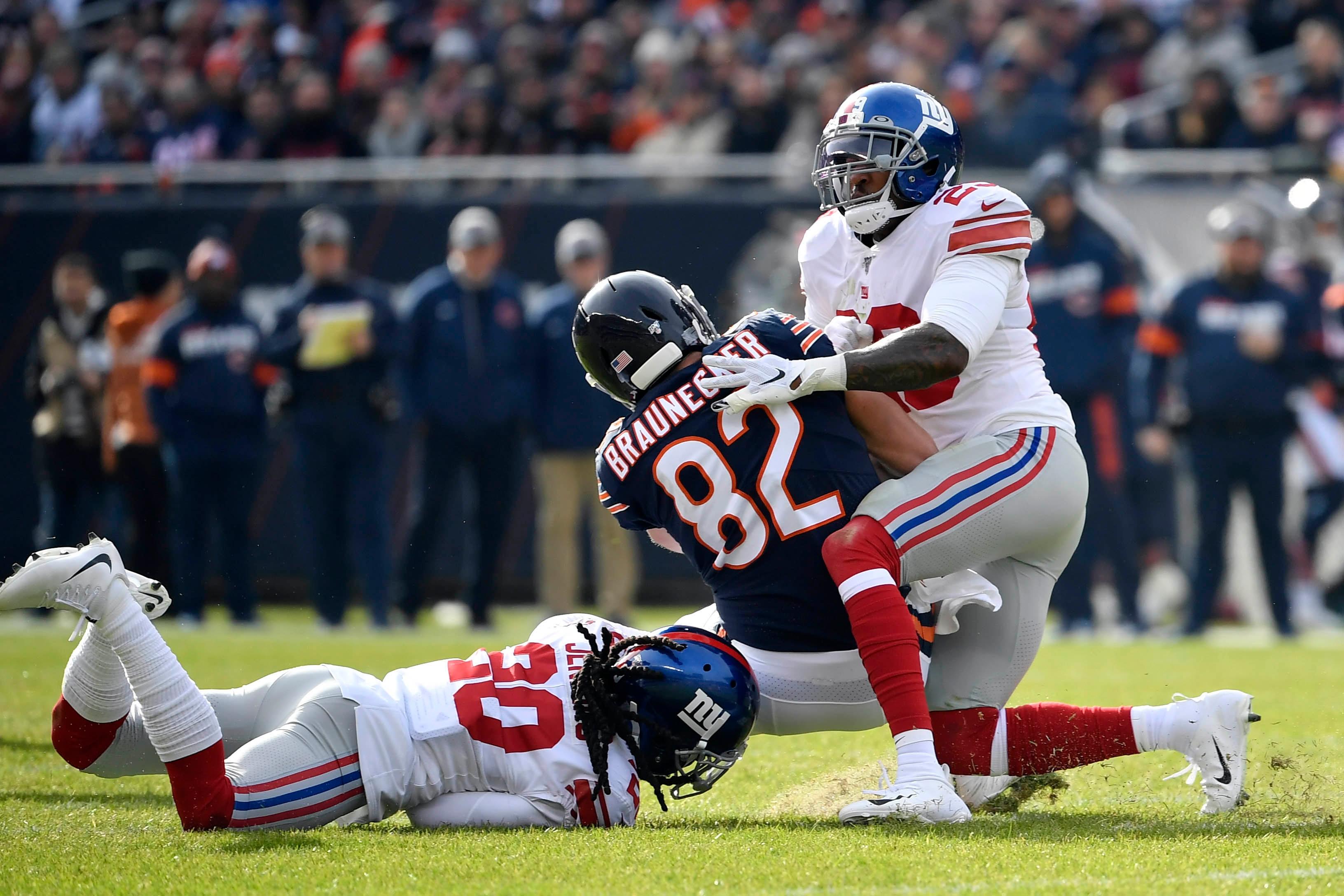 Nov 24, 2019; Chicago, IL, USA; New York Giants outside linebacker Deone Bucannon (29) tackles Chicago Bears tight end Ben Braunecker (82) in the first half at Soldier Field. Mandatory Credit: Quinn Harris-USA TODAY Sports