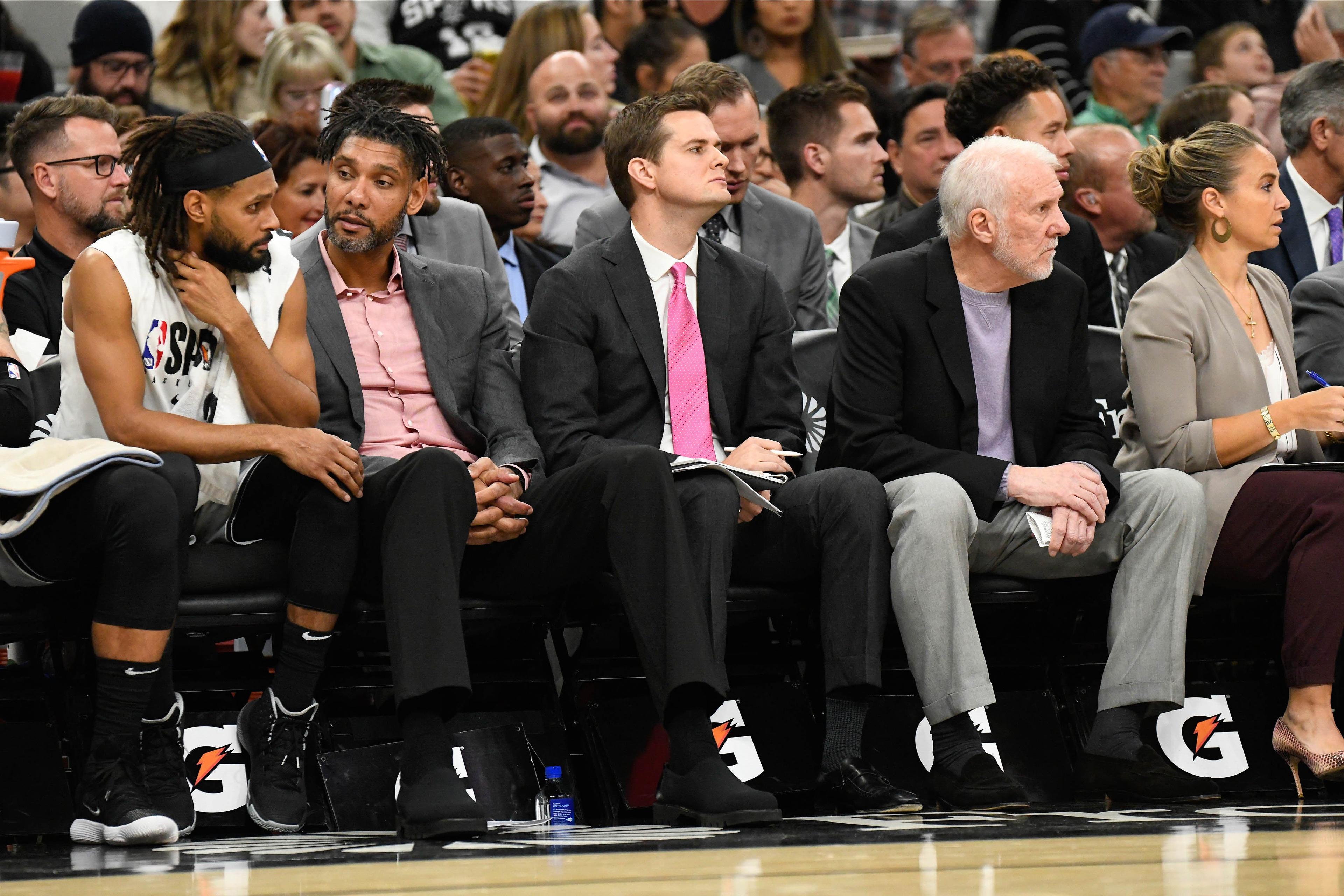 Oct 26, 2019; San Antonio, TX, USA; San Antonio Spurs (from left to right) guard Patty Mills (14), assistant coaches Tim Duncan and Will Hardy, head coach Gregg Popovich and assistant coach Becky Hammon during the third quarter against the Washington Wizards at AT&T Center. Mandatory Credit: Scott Wachter-USA TODAY Sports / Scott Wachter