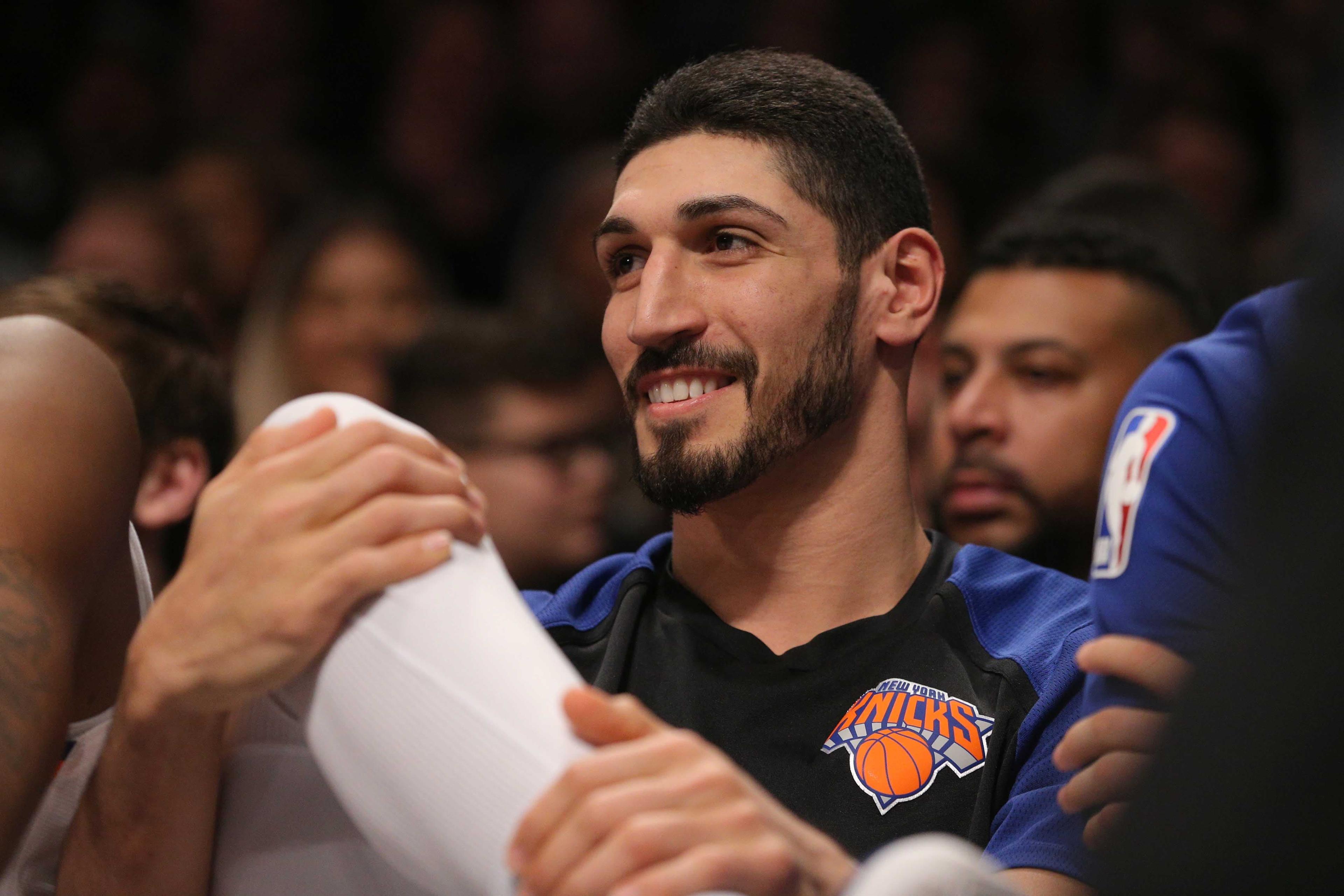 New York Knicks center Enes Kanter reacts as fans chant "we want Kanter" during the fourth quarter against the Brooklyn Nets at Barclays Center. / Brad Penner/USA TODAY Sports