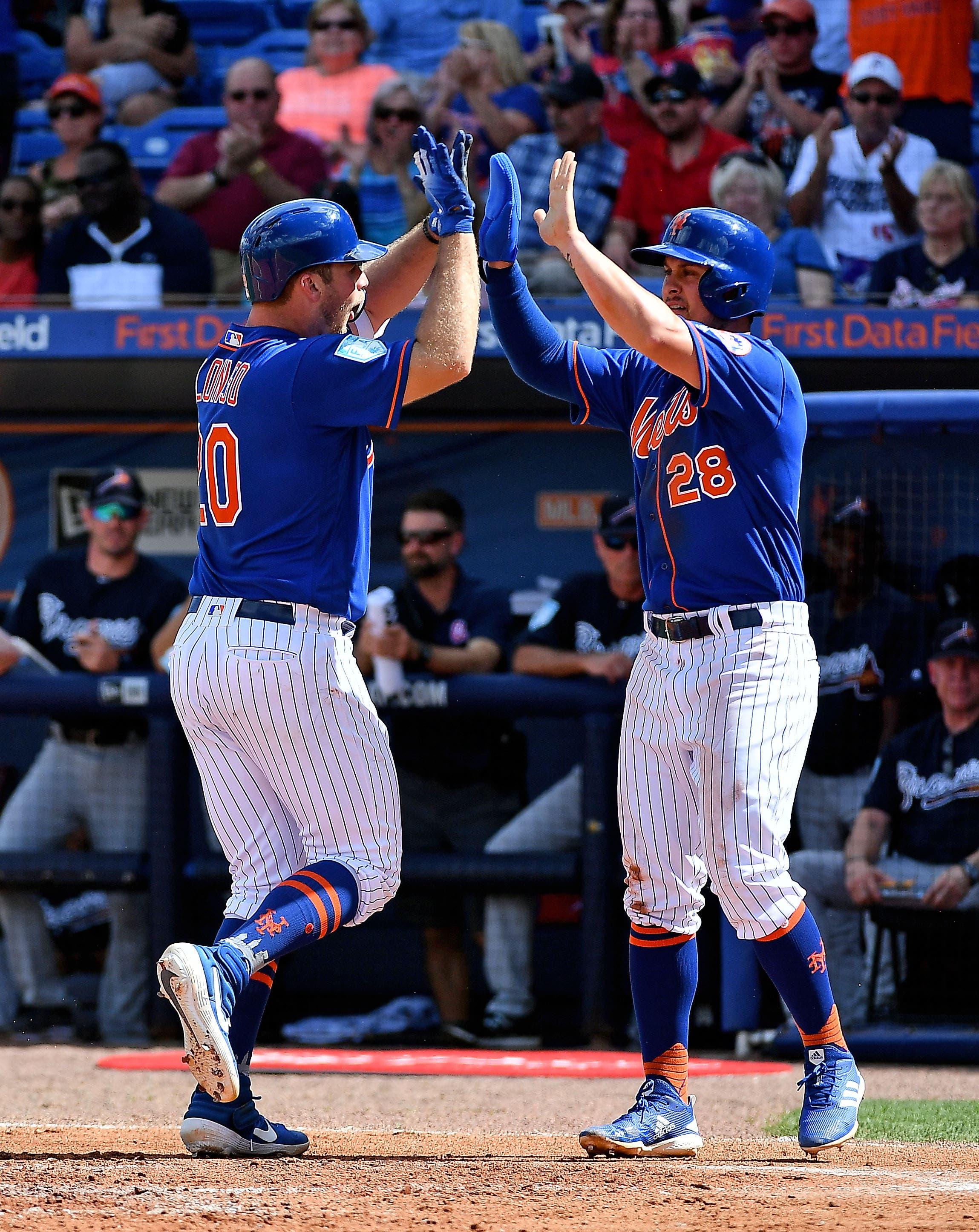 Feb 23, 2019; Port St. Lucie, FL, USA; New York Mets first baseman Peter Alonso (20) celebrates his home run in the second inning against the Atlanta Braves with Third baseman J.D. Davis (28) at First Data Field. Mandatory Credit: Jasen Vinlove-USA TODAY Sports / Jasen Vinlove