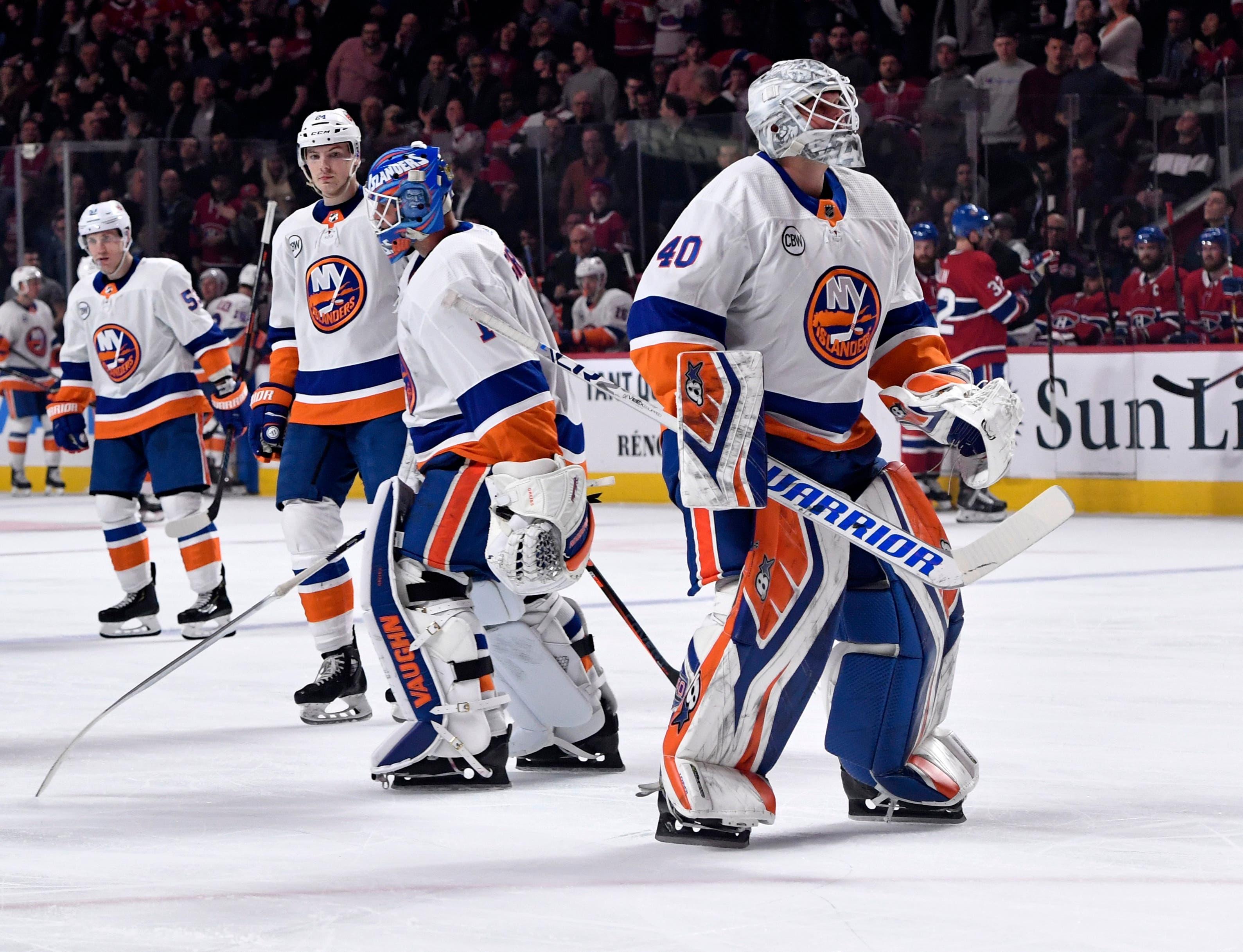 Mar 21, 2019; Montreal, Quebec, CAN; New York Islanders goalie Robin Lehner (40) replaces teammate Thomas Greiss (1) during the second period of the game against the Montreal Canadiens at the Bell Centre. Mandatory Credit: Eric Bolte-USA TODAY Sports / Eric Bolte