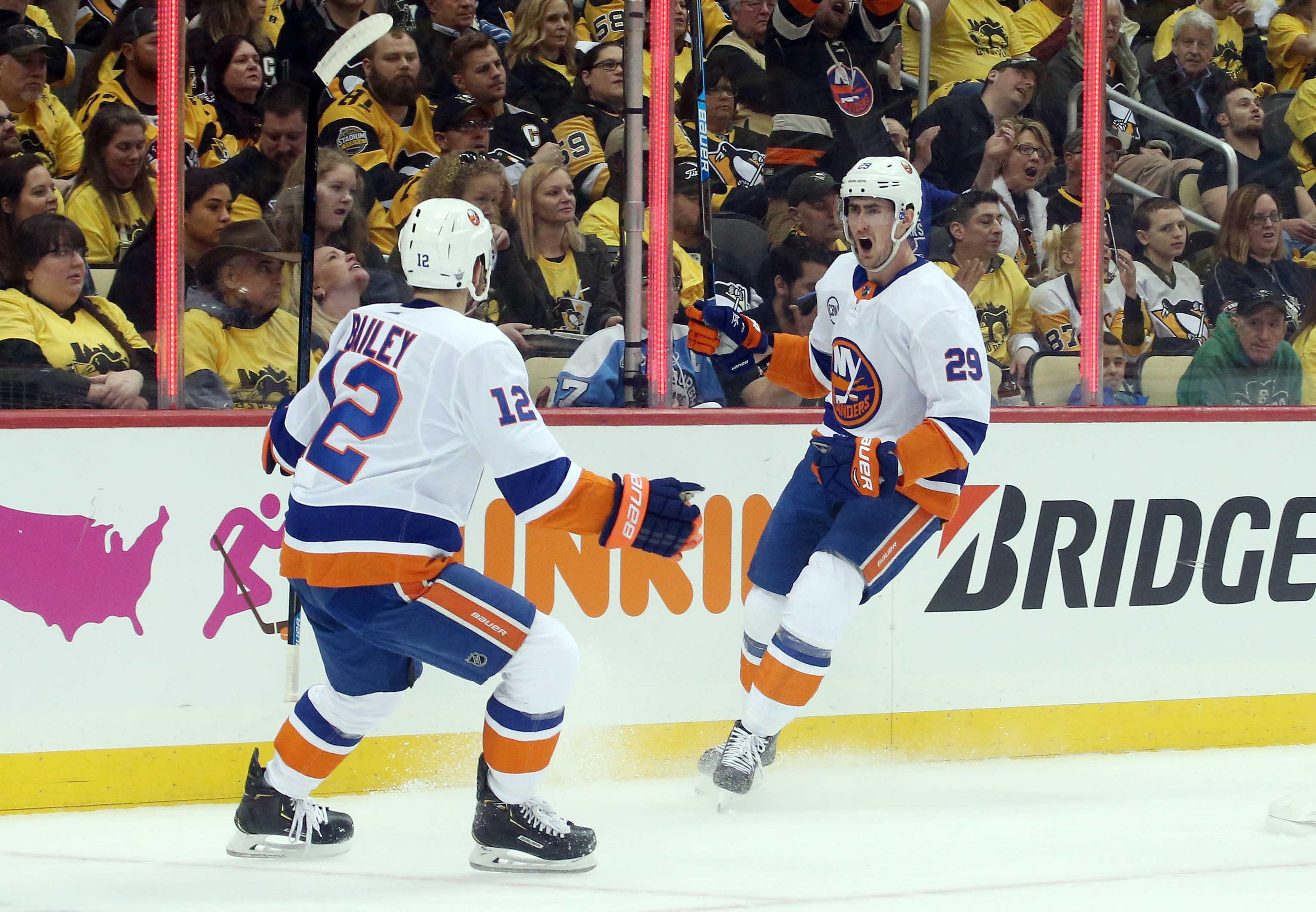 Apr 14, 2019; Pittsburgh, PA, USA; New York Islanders center Brock Nelson (29) reacts with right wing Josh Bailey (12) after scoring a goal against the Pittsburgh Penguins during the first period in game three of the first round of the 2019 Stanley Cup Playoffs at PPG PAINTS Arena. Mandatory Credit: Charles LeClaire-USA TODAY Sports / Charles LeClaire