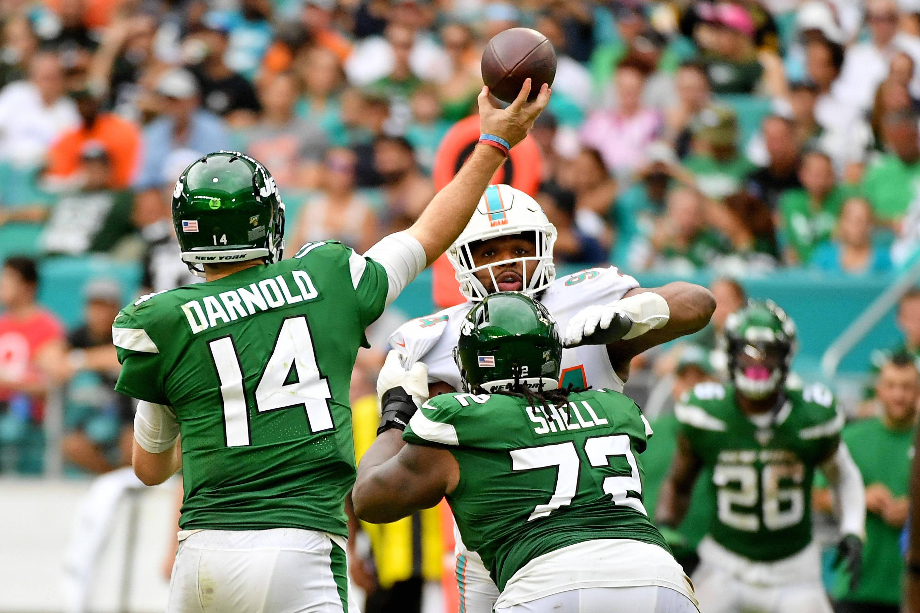 Nov 3, 2019; Miami Gardens, FL, USA; New York Jets quarterback Sam Darnold (14) attempts a pass against the Miami Dolphins during the second half at Hard Rock Stadium. Mandatory Credit: Jasen Vinlove-USA TODAY Sports