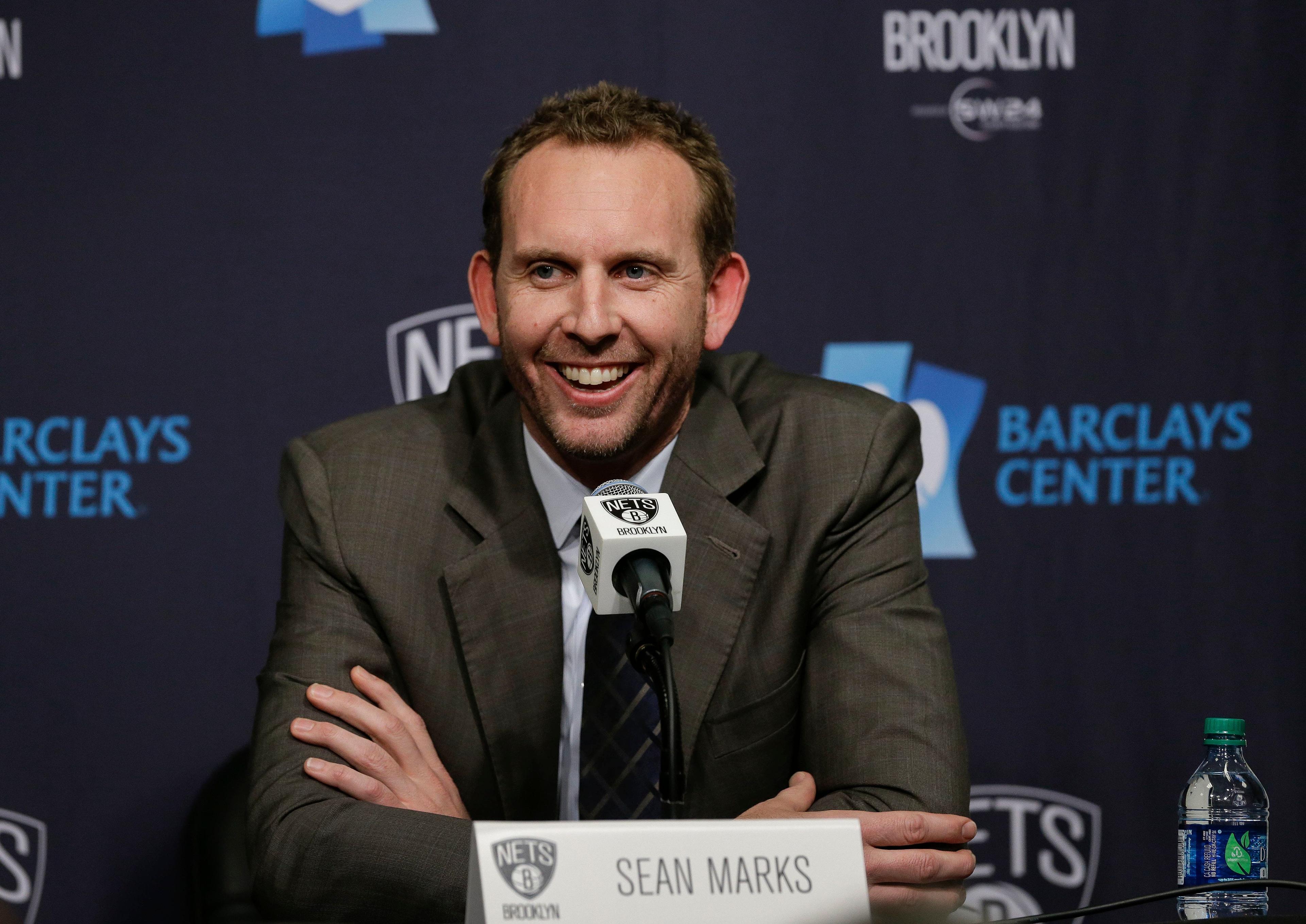 Sean Marks answers questions during a news conference where he was introduced as the new general manager of the Brooklyn Nets, before the Nets' NBA basketball game against the New York Knicks, Friday, Feb. 19, 2016, in New York. (AP Photo/Julie Jacobson / Julie Jacobso/AP