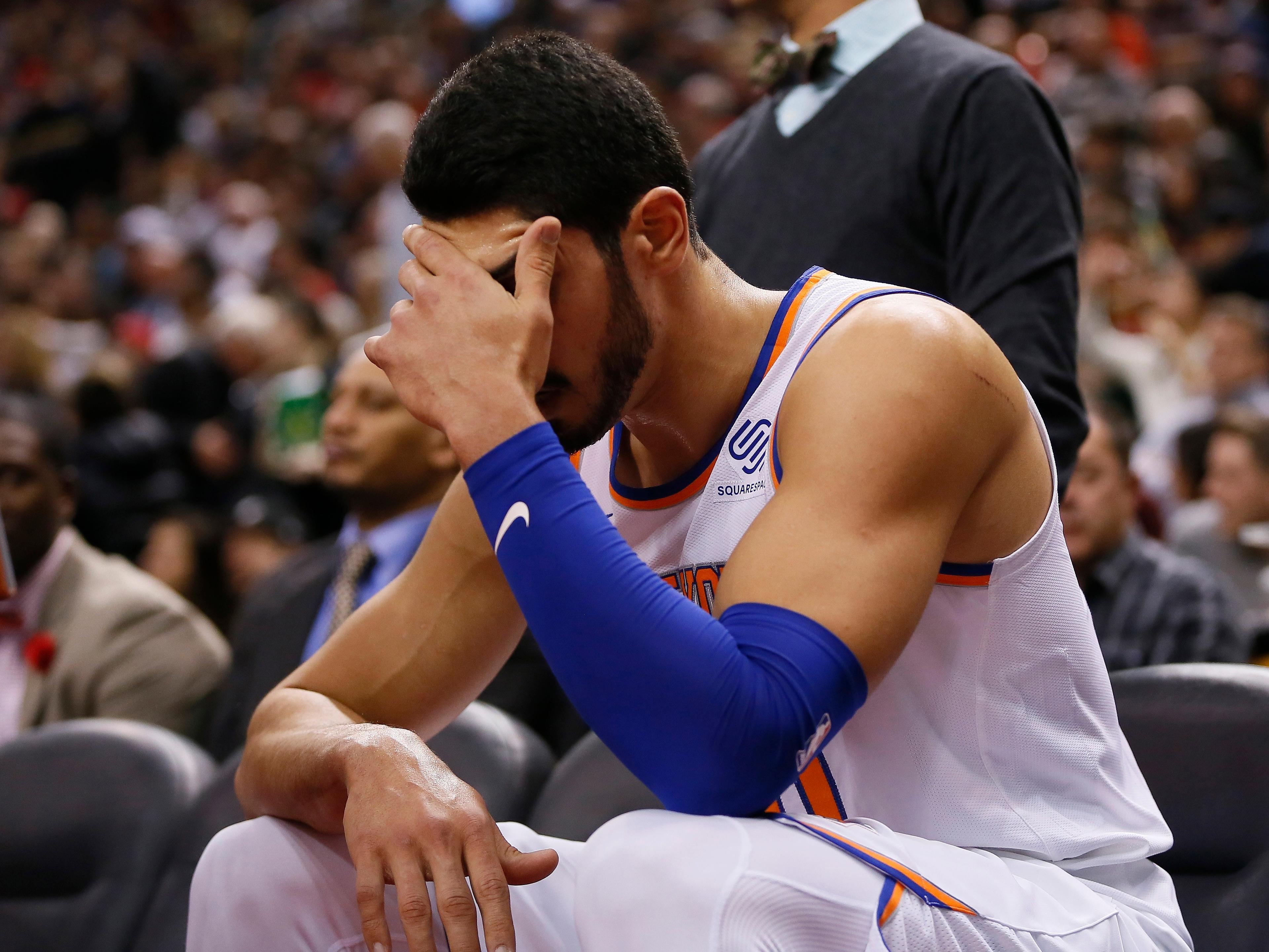 New York Knicks center Enes Kanter reacts after a play against the Toronto Raptors at Scotiabank Arena.