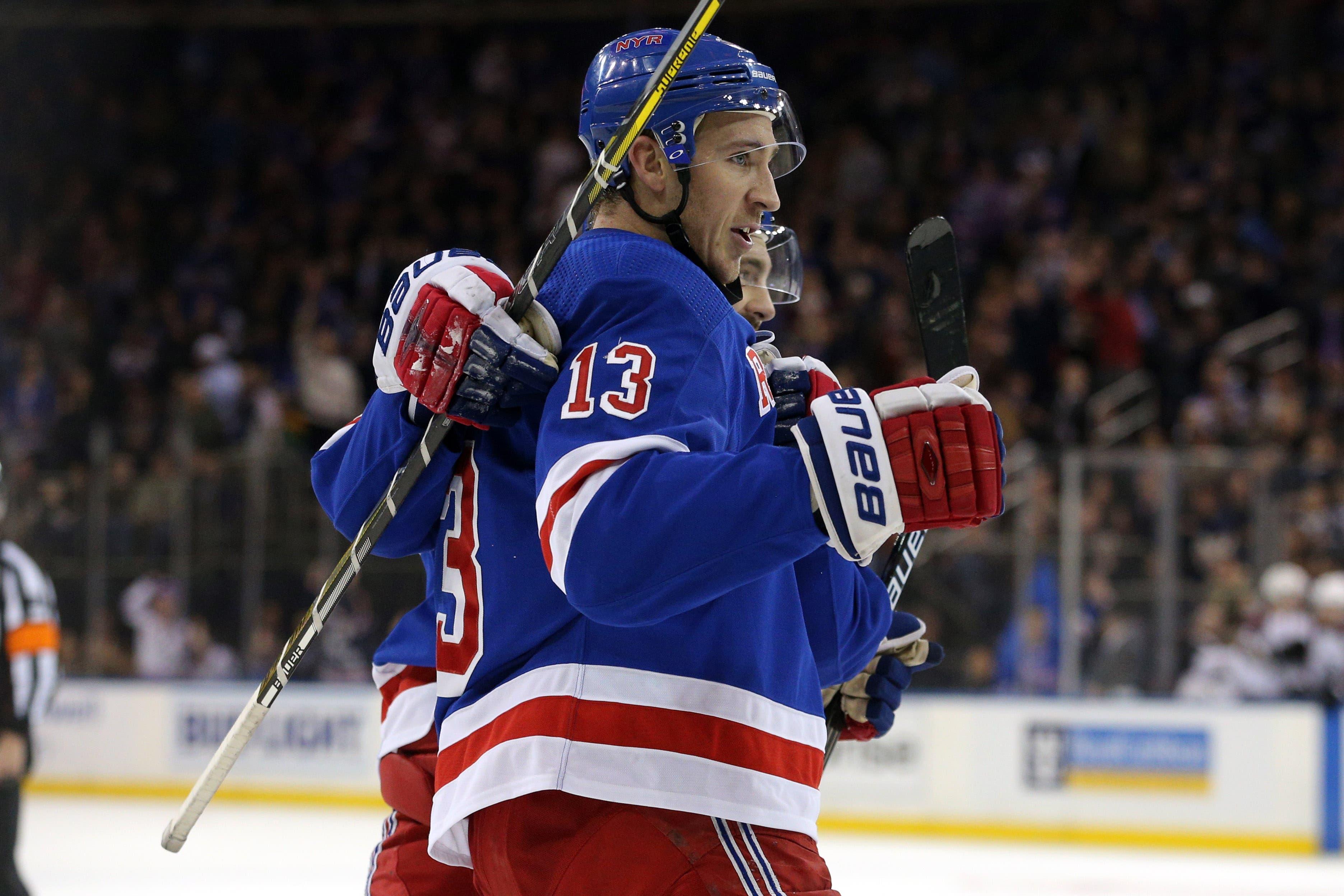 Oct 16, 2018; New York, NY, USA; New York Rangers center Kevin Hayes (13) celebrates his goal against the Colorado Avalanche with teammates during the second period at Madison Square Garden. Mandatory Credit: Brad Penner-USA TODAY Sports / Brad Penner