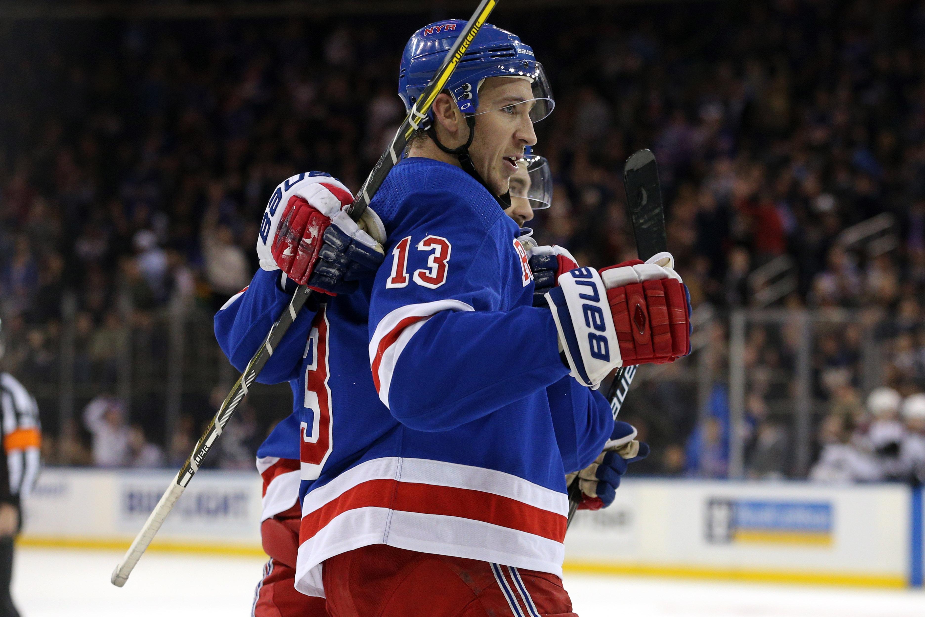 Oct 16, 2018; New York, NY, USA; New York Rangers center Kevin Hayes (13) celebrates his goal against the Colorado Avalanche with teammates during the second period at Madison Square Garden. Mandatory Credit: Brad Penner-USA TODAY Sports