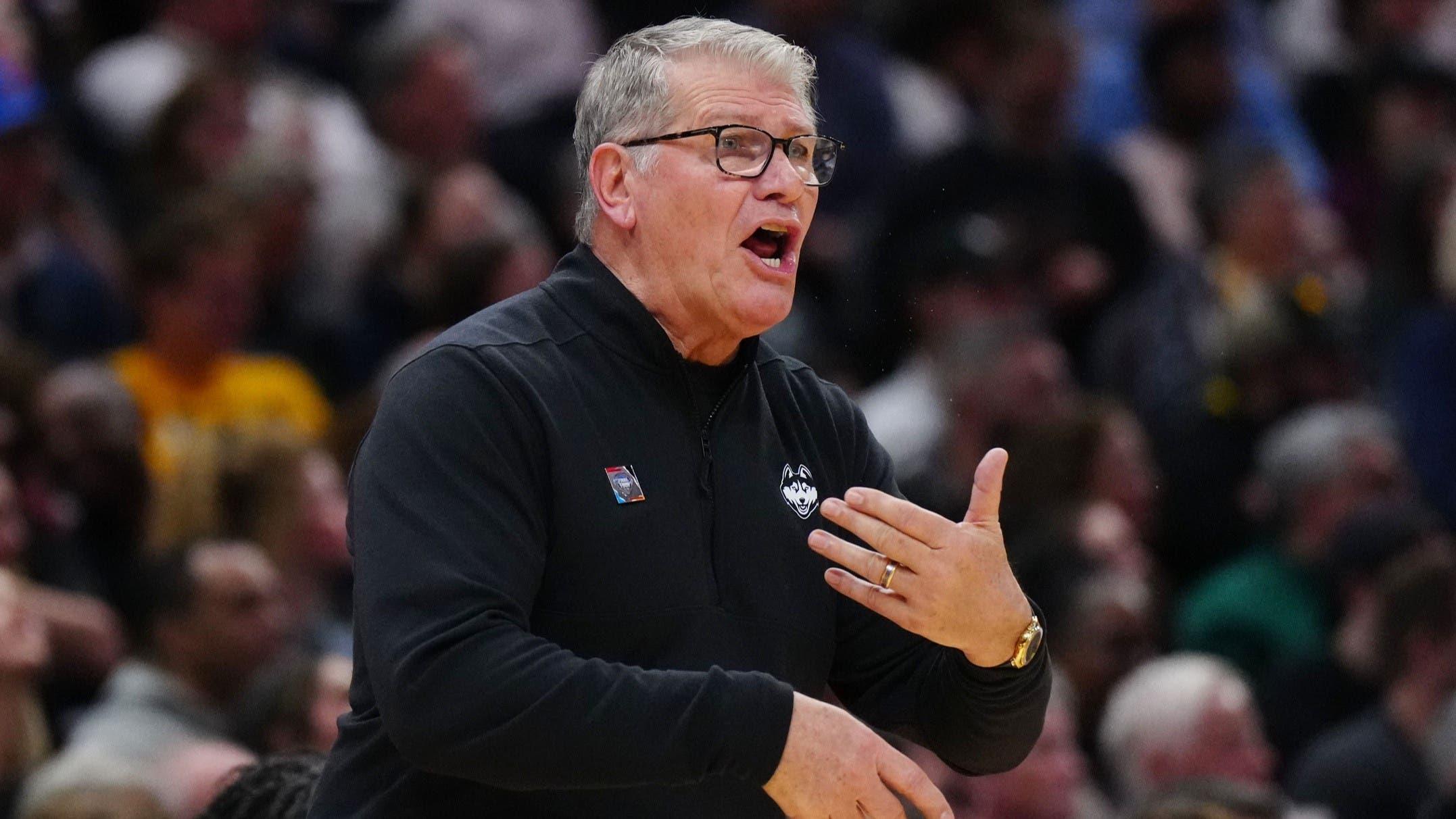 Apr 5, 2024; Cleveland, OH, USA; Connecticut Huskies head coach Geno Auriemma reacts in the first quarter against the Iowa Hawkeyes in the semifinals of the Final Four of the womens 2024 NCAA Tournament at Rocket Mortgage FieldHouse. / Kirby Lee-Imagn Images