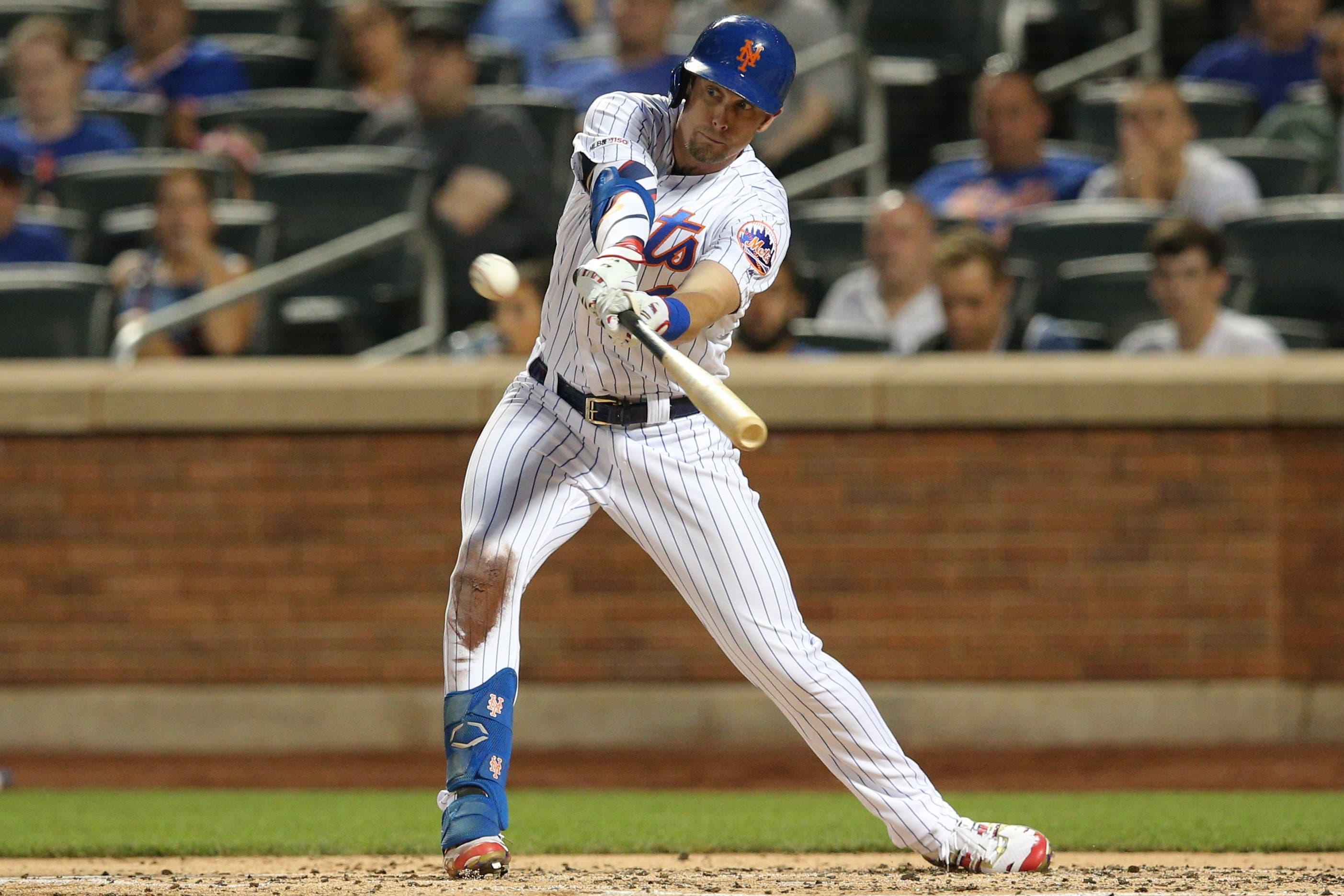 New York Mets right fielder Jeff McNeil hits an RBI single against the Philadelphia Phillies during the second inning at Citi Field. / Brad Penner/USA TODAY Sports