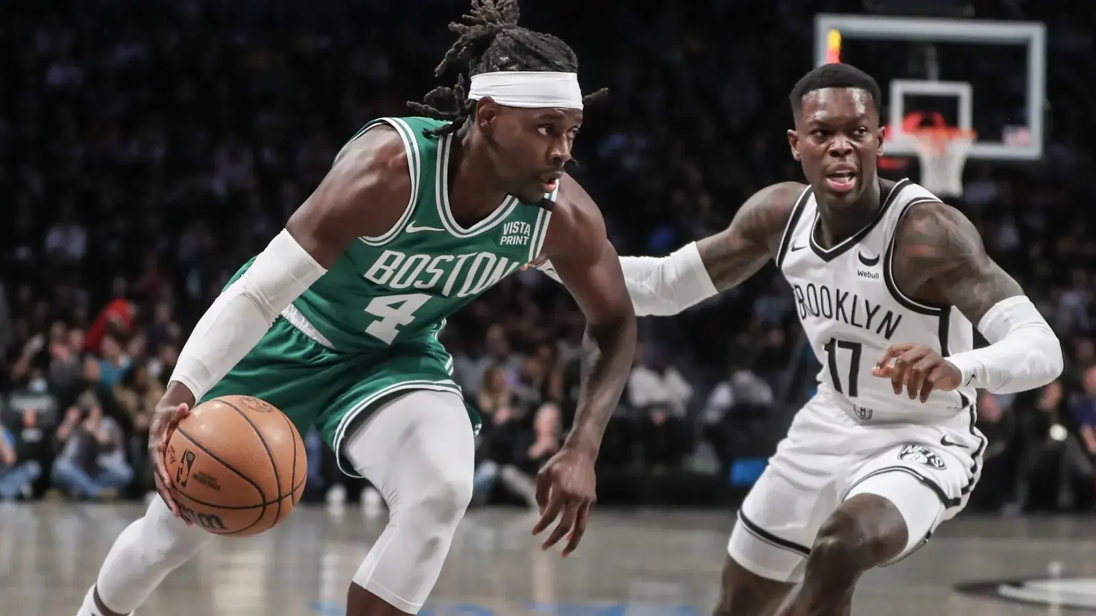 Boston Celtics guard Jrue Holiday (4) looks to drive past Brooklyn Nets guard Dennis Schroder (17) in the first quarter at Barclays Center. / Wendell Cruz-USA TODAY Sports