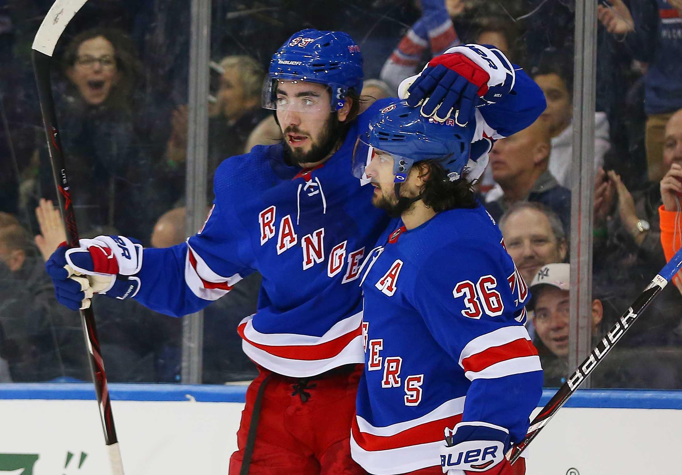 Feb 2, 2019; New York, NY, USA; New York Rangers right wing Mats Zuccarello (36) is congratulated by center Mika Zibanejad (93) after scoring a goal against the Tampa Bay Lightning during the second period at Madison Square Garden. Mandatory Credit: Andy Marlin-USA TODAY Sports