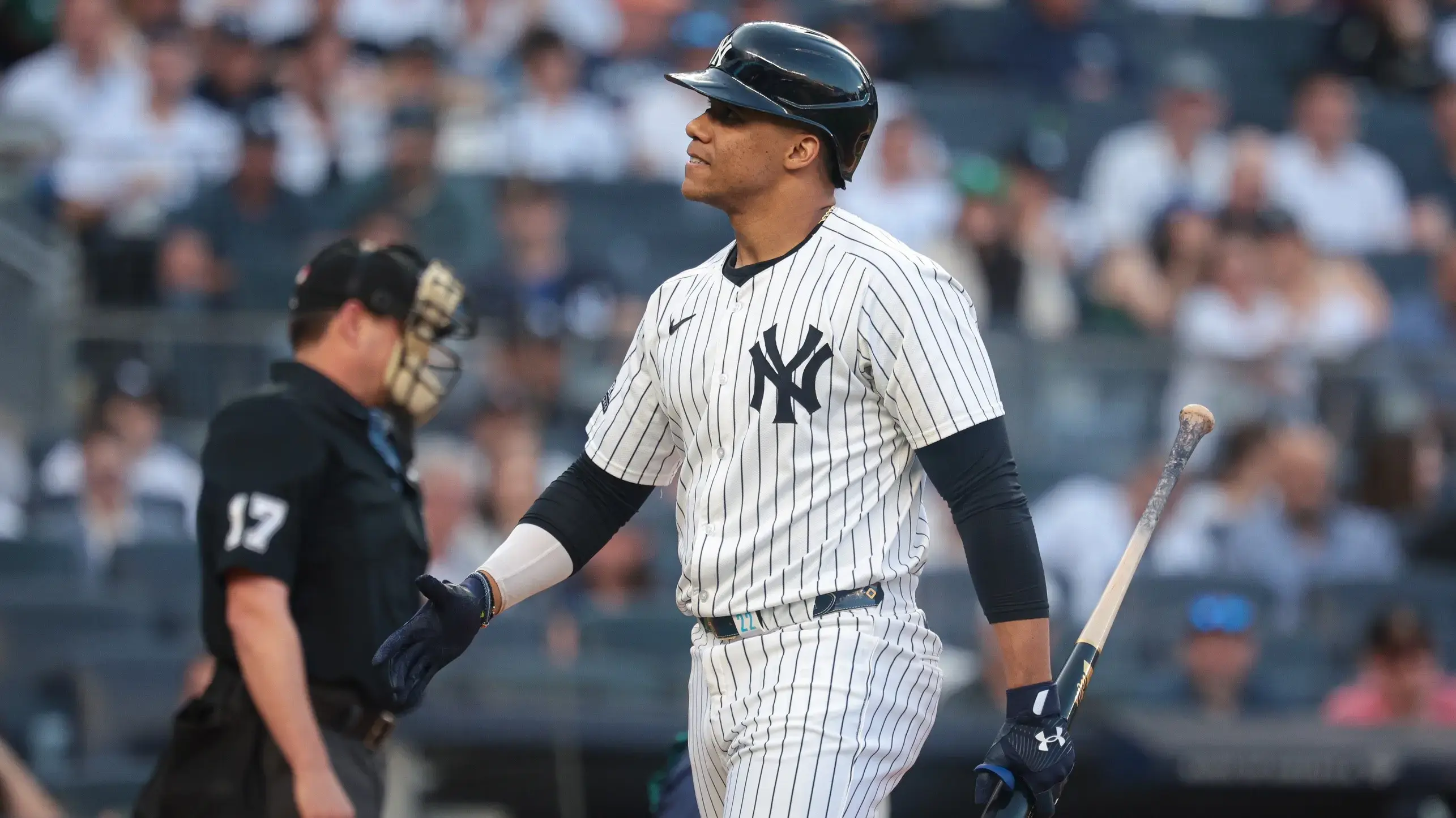May 21, 2024; Bronx, New York, USA; New York Yankees right fielder Juan Soto (22) reacts after being called out on strikes during the first inning against the Seattle Mariners at Yankee Stadium. / Vincent Carchietta-USA TODAY Sports