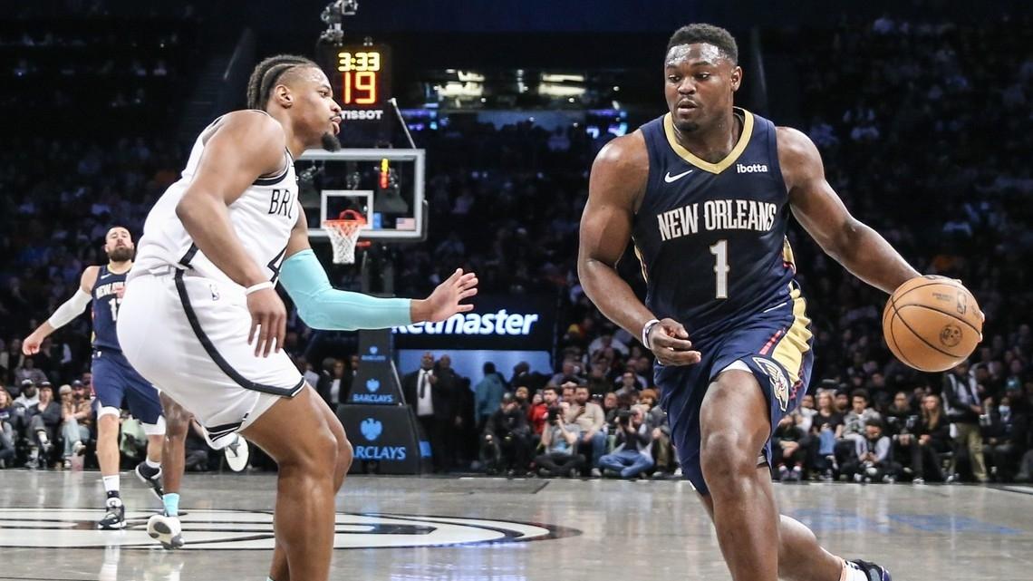 New Orleans Pelicans forward Zion Williamson (1) looks to drive past Brooklyn Nets guard Dennis Smith Jr. (4) in the second quarter at Barclays Center. / Wendell Cruz-USA TODAY Sports