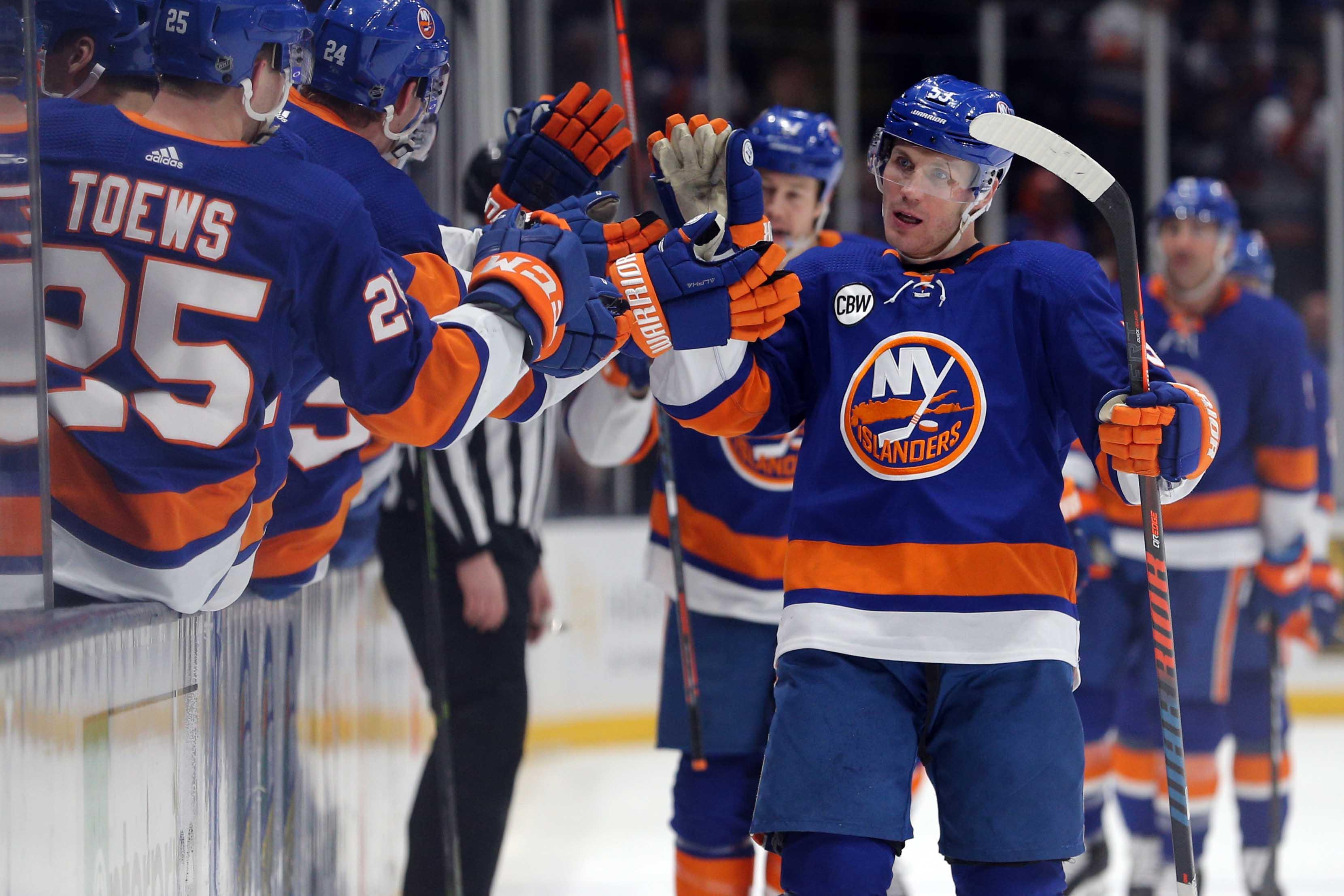 New York Islanders center Casey Cizikas celebrates his goal against the Los Angeles Kings with teammates during the first period at Nassau Veterans Memorial Coliseum. / Brad Penner/USA TODAY Sports