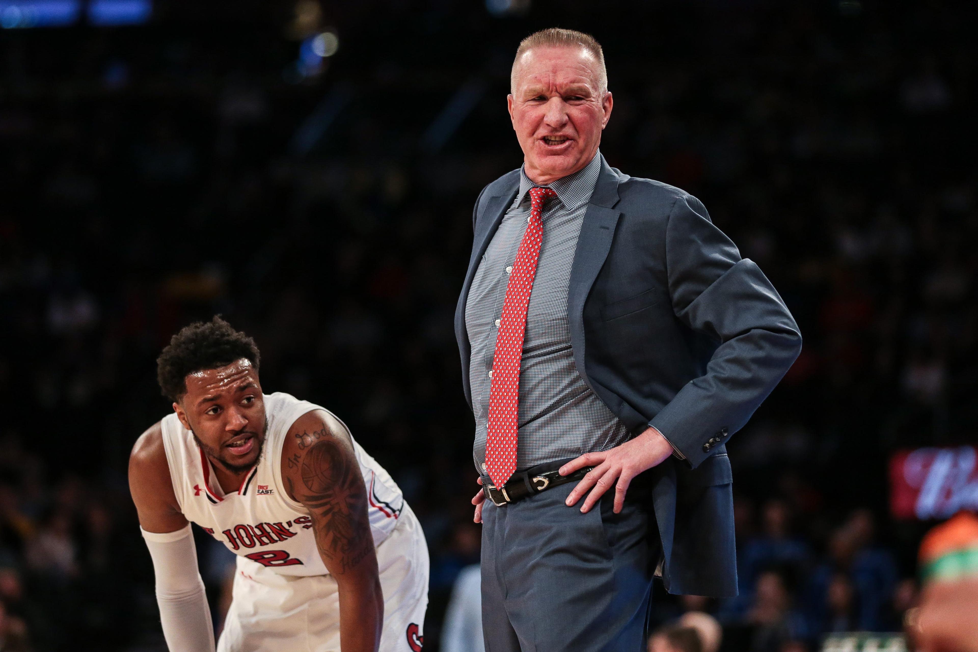 Mar 13, 2019; New York, NY, USA; St. John's Red Storm head coach Chris Mullin coaches in front of guard Shamorie Ponds (2) during the first half in the Big East conference tournament against the DePaul Blue Demons at Madison Square Garden. Mandatory Credit: Vincent Carchietta-USA TODAY Sports / Vincent Carchietta