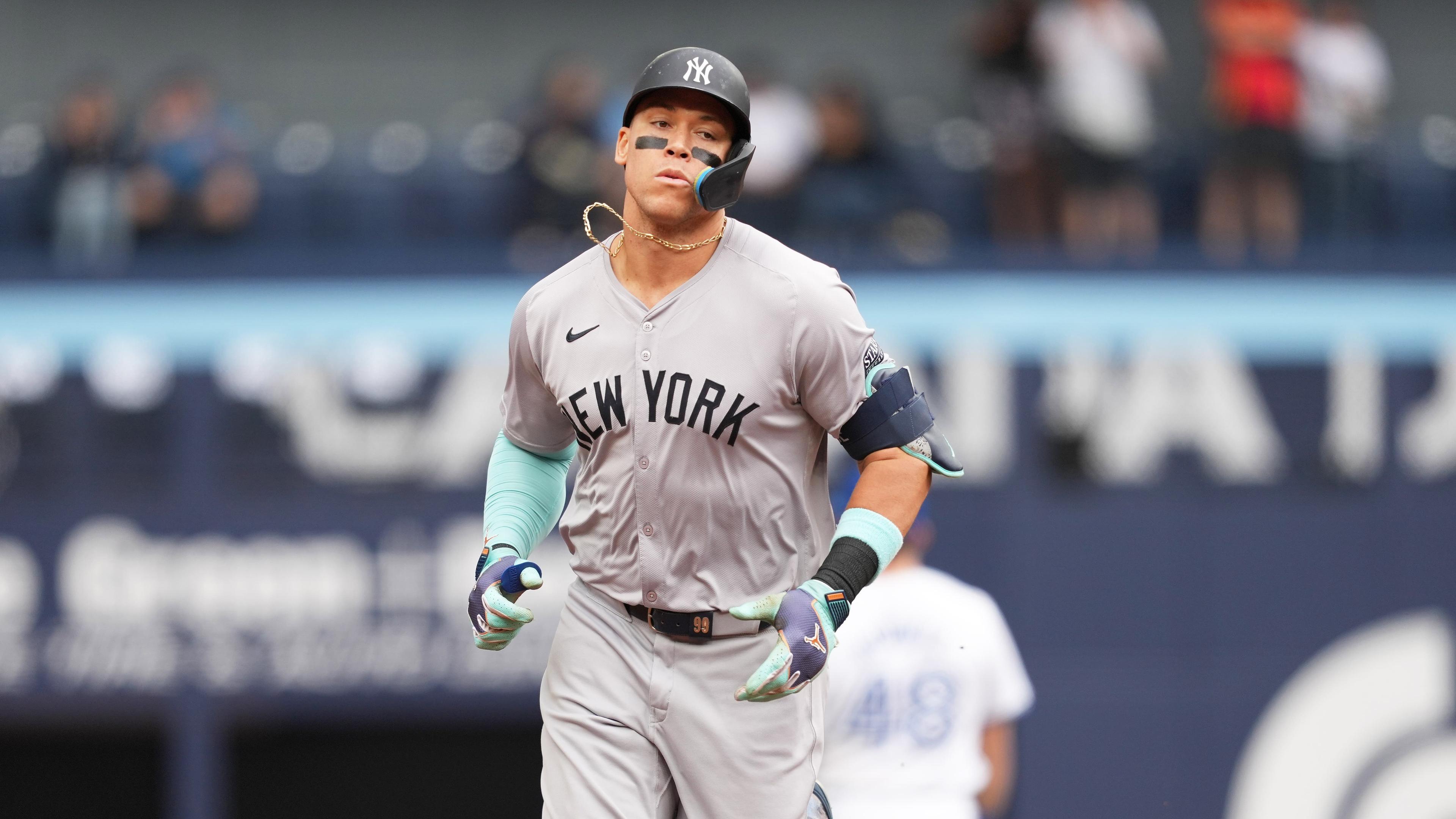 Jun 30, 2024; Toronto, Ontario, CAN; New York Yankees designated hitter Aaron Judge (99) runs the bases after hitting a two run home run against the Toronto Blue Jays during the first inning at Rogers Centre. Mandatory Credit: Nick Turchiaro-USA TODAY Sports / © Nick Turchiaro-USA TODAY Sports