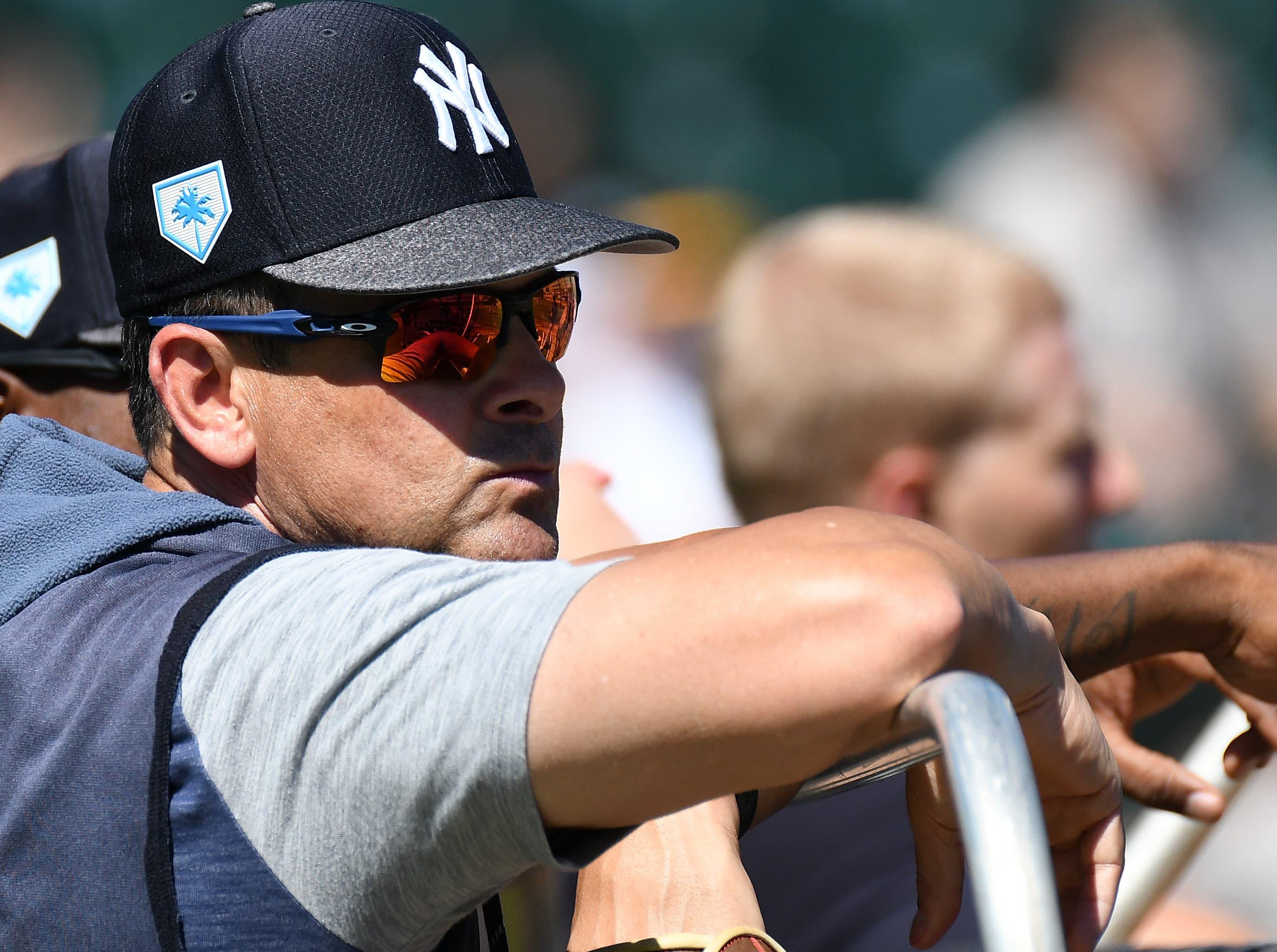 New York Yankees manager Aaron Boone watches batting practice before the start of the spring training game against the Pittsburgh Pirates at LECOM Park. / Jonathan Dyer/USA TODAY Sports