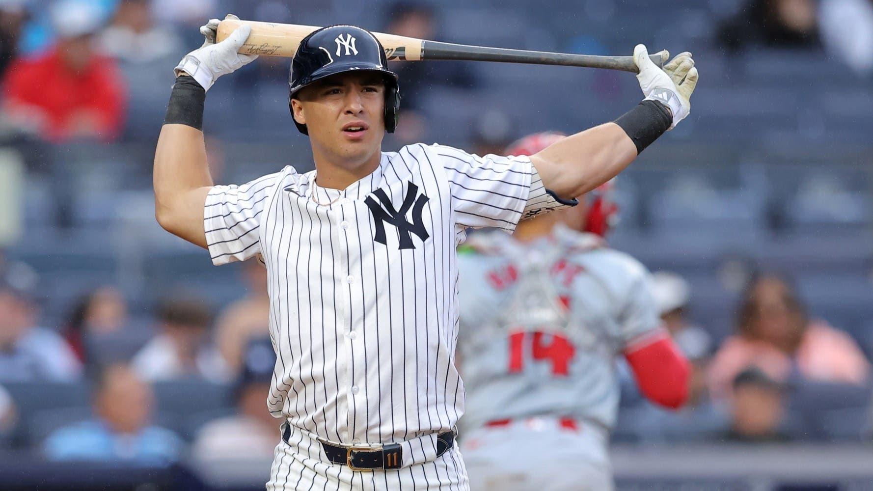 Aug 7, 2024; Bronx, New York, USA; New York Yankees shortstop Anthony Volpe (11) reacts after striking out to end the sixth inning against the Los Angeles Angels at Yankee Stadium. / Brad Penner-USA TODAY Sports