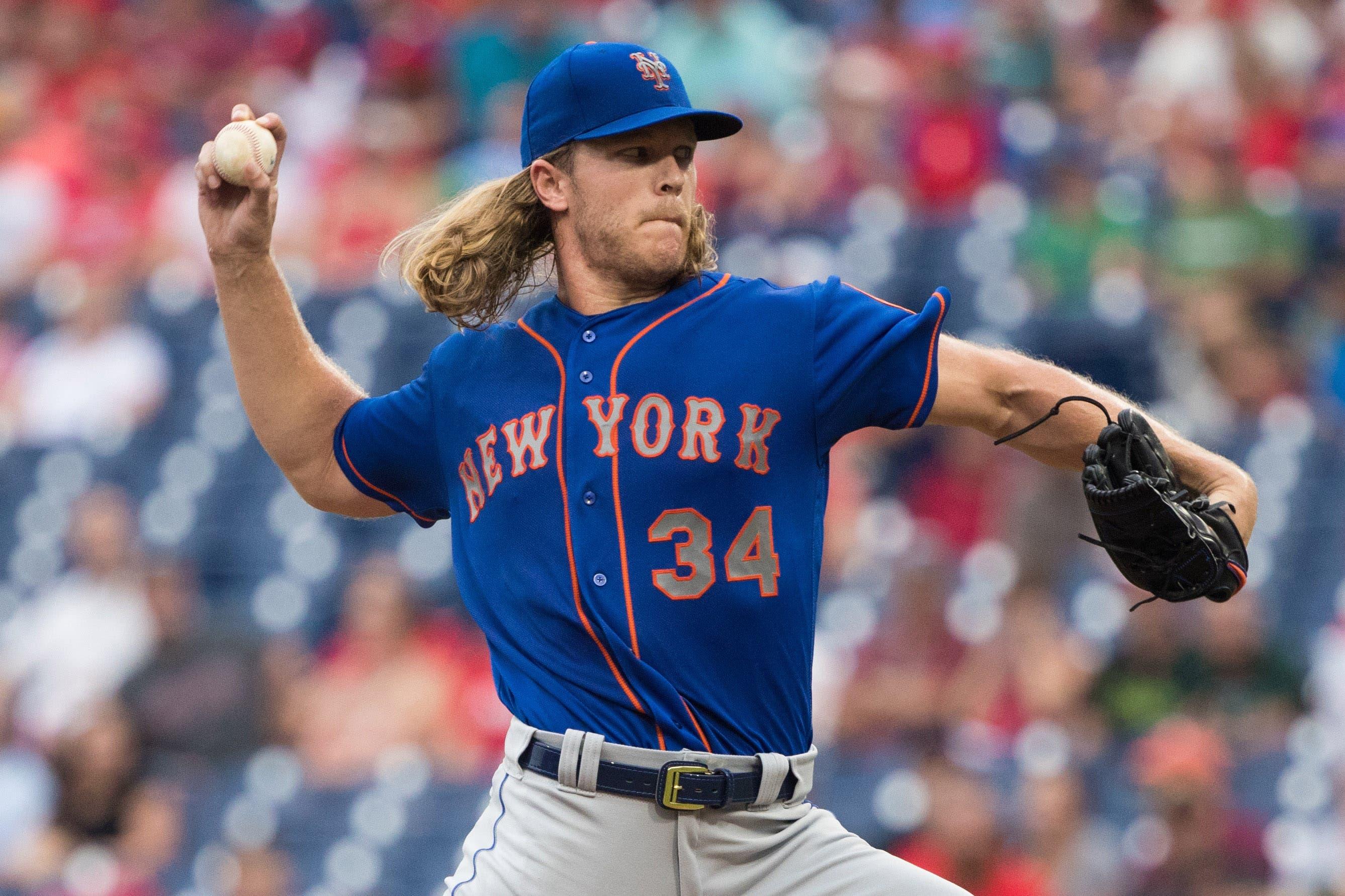 New York Mets starting pitcher Noah Syndergaard pitches during the first inning against the Philadelphia Phillies at Citizens Bank Park. / Bill Streicher/USA TODAY Sports