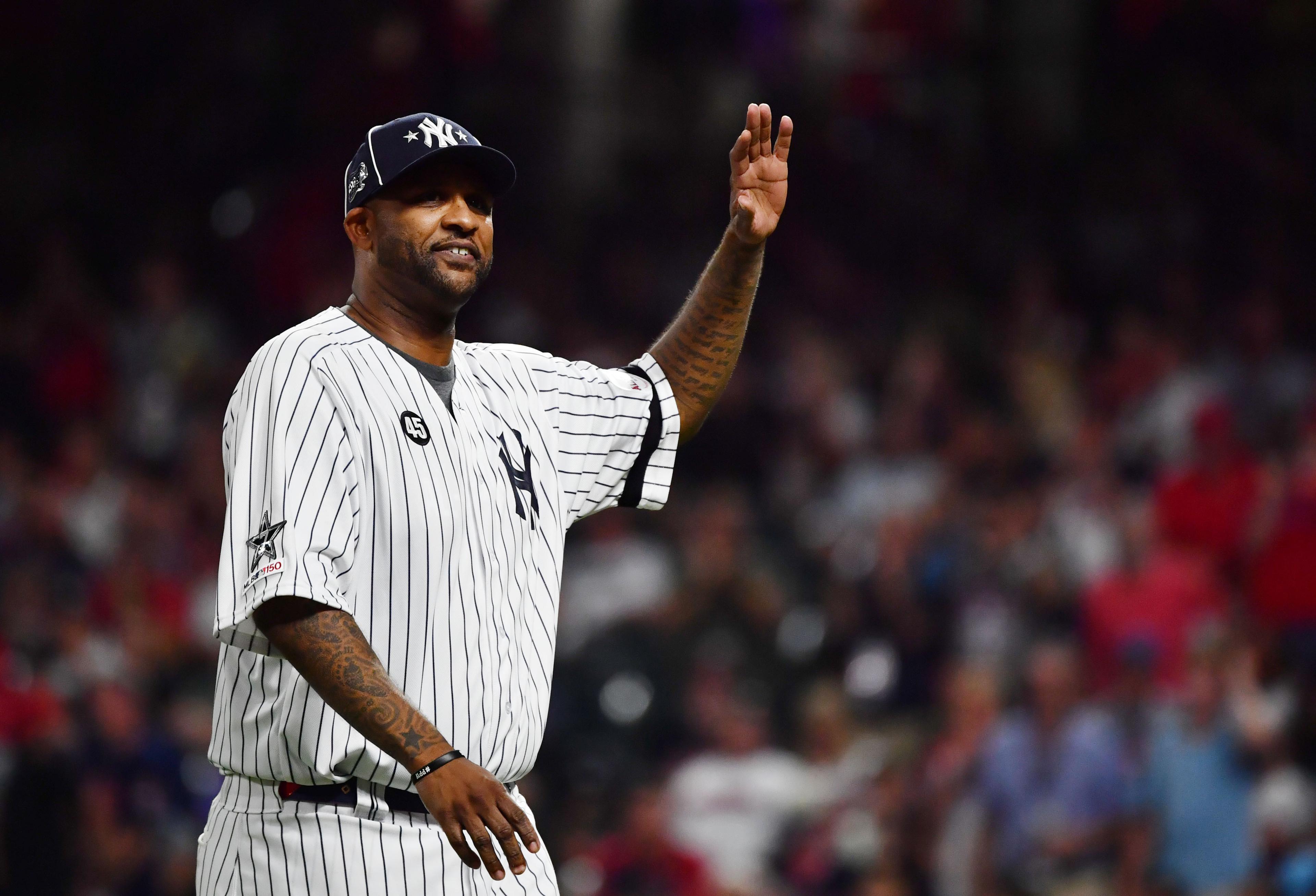 Jul 9, 2019; Cleveland, OH, USA; New York Yankees pitcher CC Sabathia visits American League pitcher Aroldis Chapman (not pictured) of the New York Yankees on the mound during the ninth inning in the 2019 MLB All Star Game at Progressive Field. Mandatory Credit: Ken Blaze-USA TODAY Sports