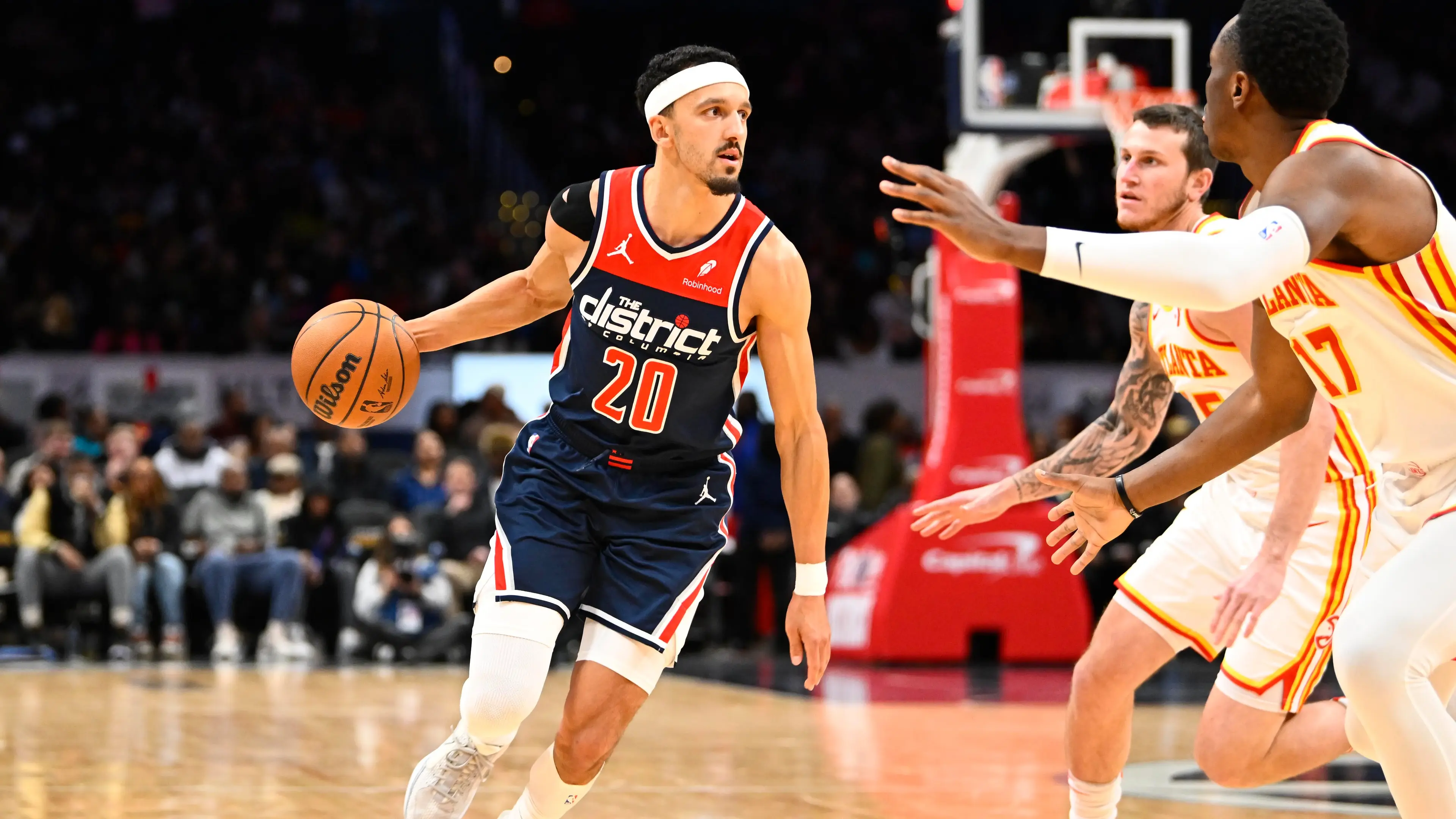 Washington Wizards guard Landry Shamet (20) dribbles against the Atlanta Hawks during the second half at Capital One Arena. / Brad Mills-Imagn Images