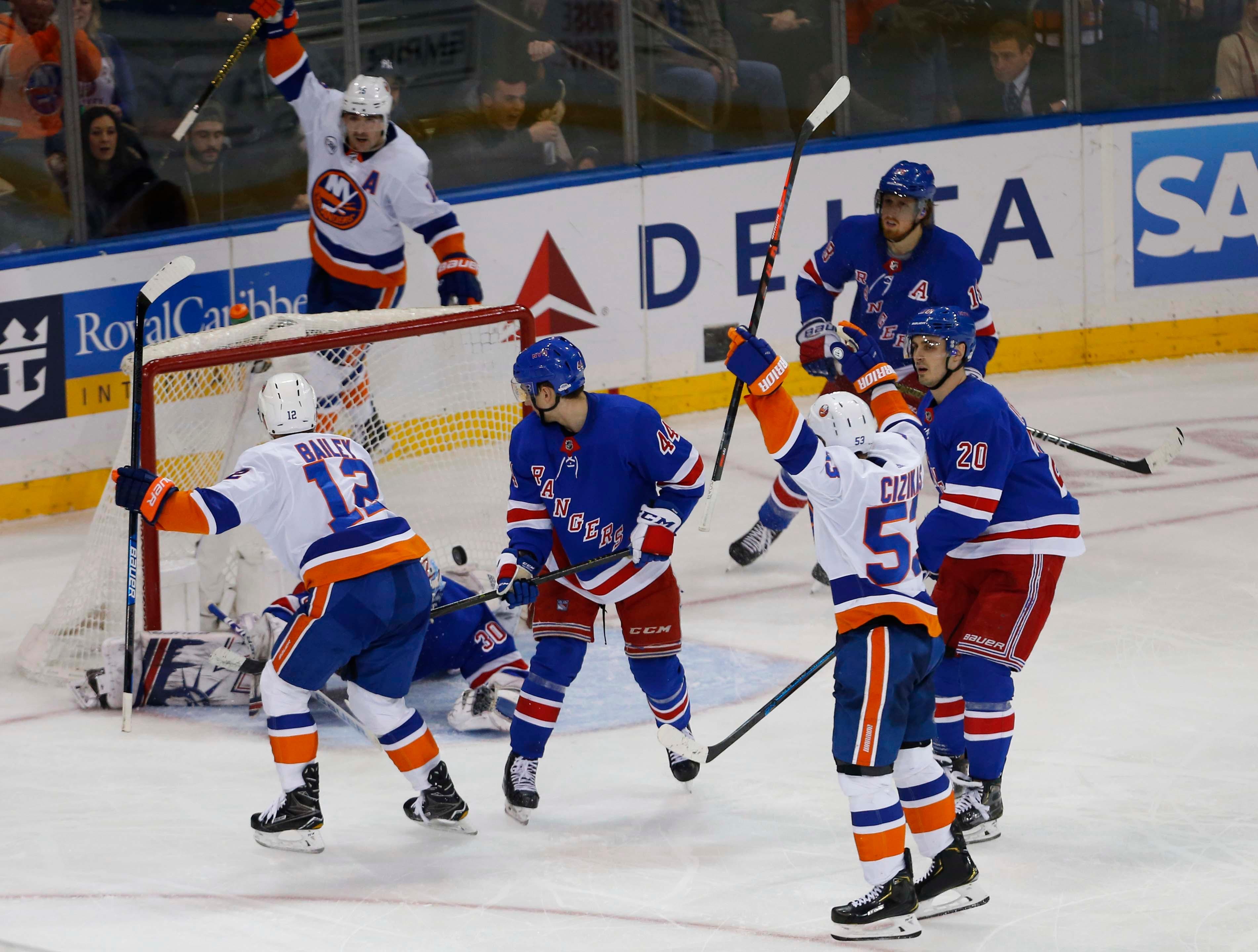 Jan 10, 2019; New York, NY, USA; New York Islanders right wing Josh Bailey (12) scores a goal the game winning goal against New York Rangers goaltender Henrik Lundqvist (30) during the third period at Madison Square Garden. The New York Islanders won 4-3.
Mandatory Credit: Noah K. Murray-USA TODAY Sports