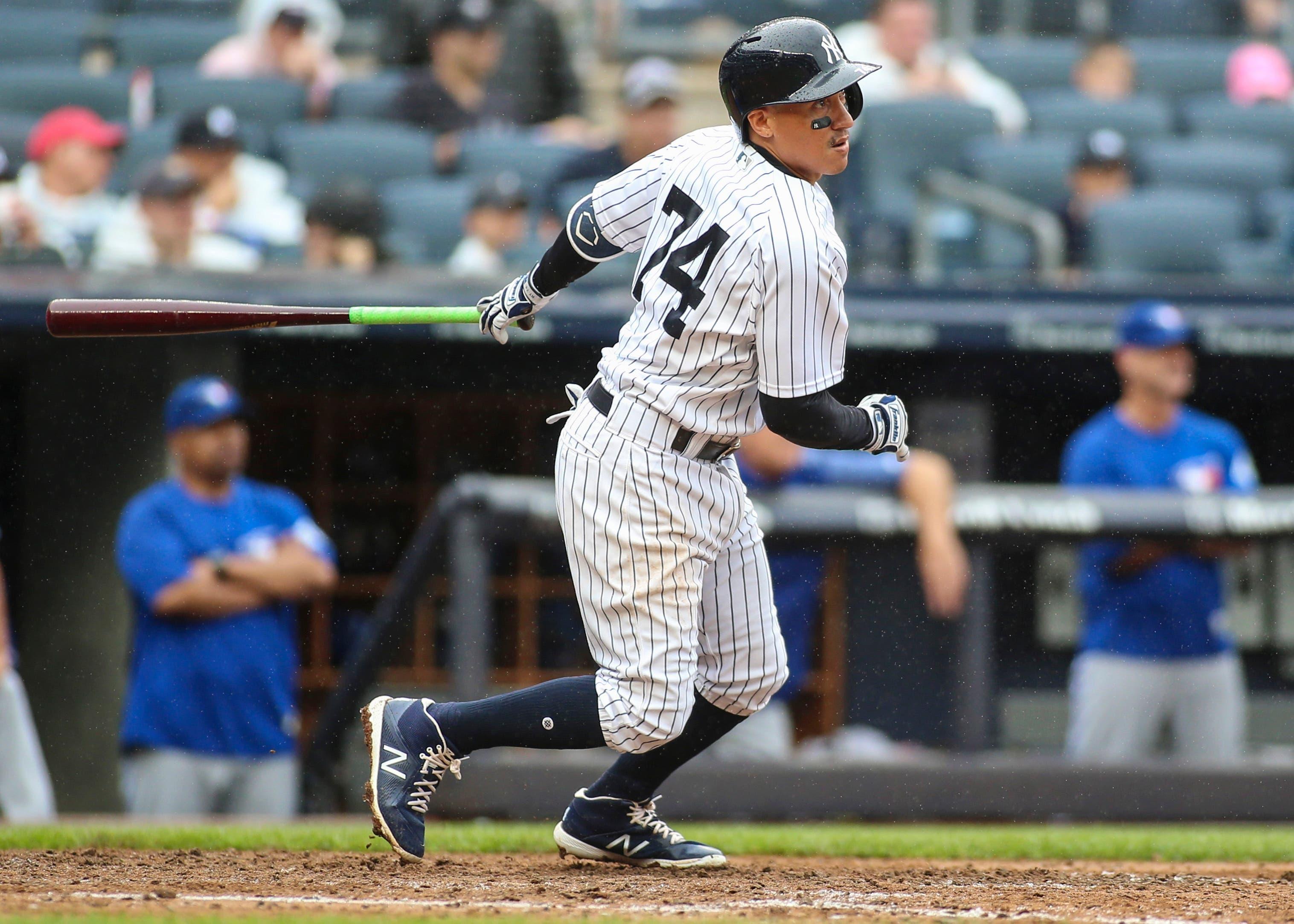 Aug 19, 2018; Bronx, NY, USA; New York Yankees shortstop Ronald Torreyes (74) hits a two run double in the sixth inning against the Toronto Blue Jays at Yankee Stadium. Mandatory Credit: Wendell Cruz-USA TODAY Sports / Wendell Cruz