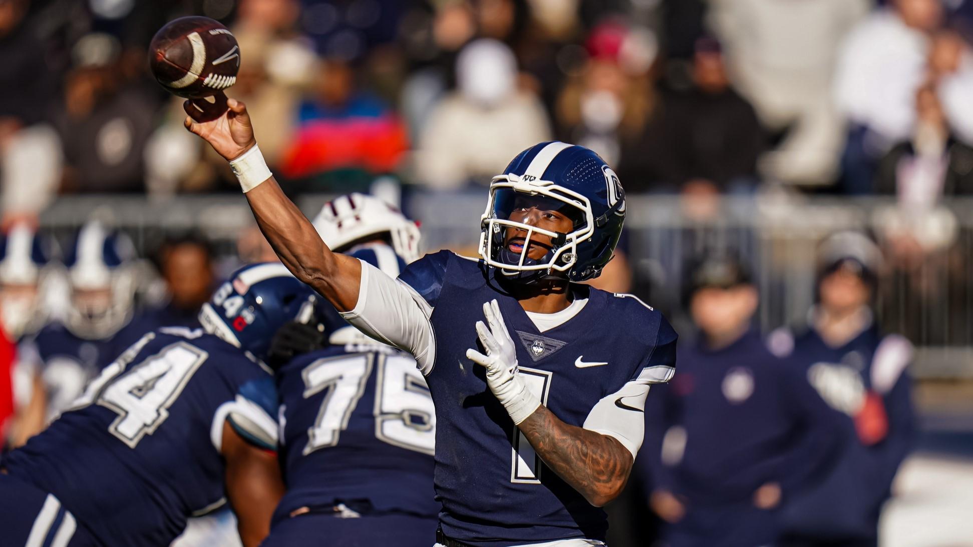 Nov 18, 2023; East Hartford, Connecticut, USA; UConn Huskies quarterback Ta'Quan Roberson (1) throws a pass against the Sacred Heart Pioneers in the second quarter at Rentschler Field at Pratt & Whitney Stadium. / David Butler II-USA TODAY Sports