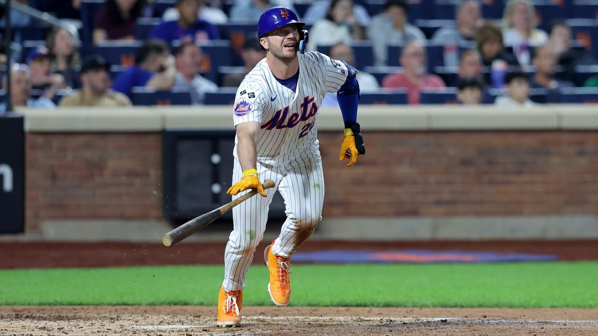 Sep 17, 2024; New York City, New York, USA; New York Mets first baseman Pete Alonso (20) follows through on a double against the Washington Nationals during the fifth inning at Citi Field. 