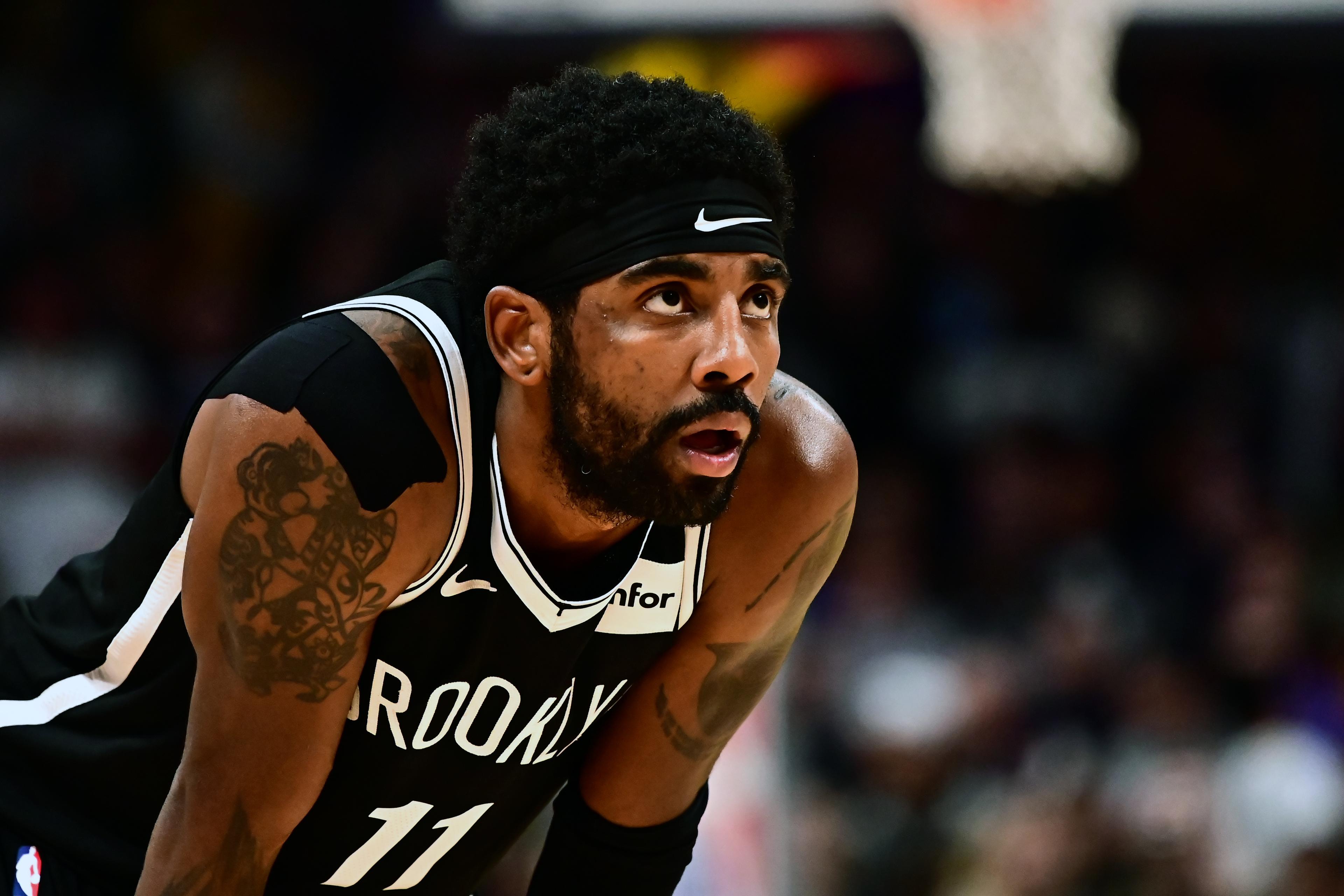 Nov 14, 2019; Denver, CO, USA; Brooklyn Nets guard Kyrie Irving (11) during the second half against the Denver Nuggets at the Pepsi Center. Mandatory Credit: Ron Chenoy-USA TODAY Sports