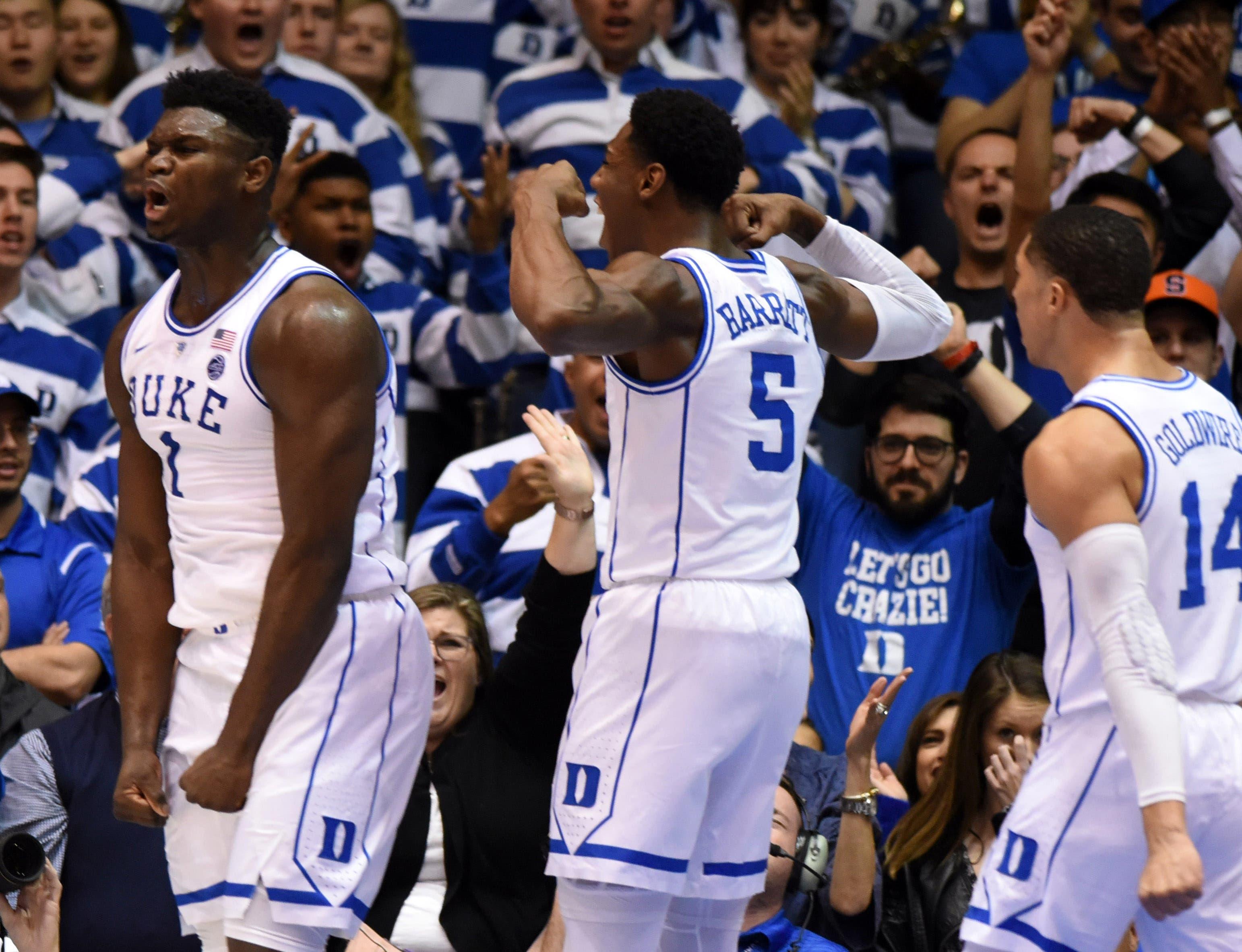 Duke Blue Devils forward Zion Williamson and forward R.J. Barrett reacts after a basket by Williamson during the first half against the Syracuse Orange at Cameron Indoor Stadium. / Rob Kinnan/USA TODAY Sports