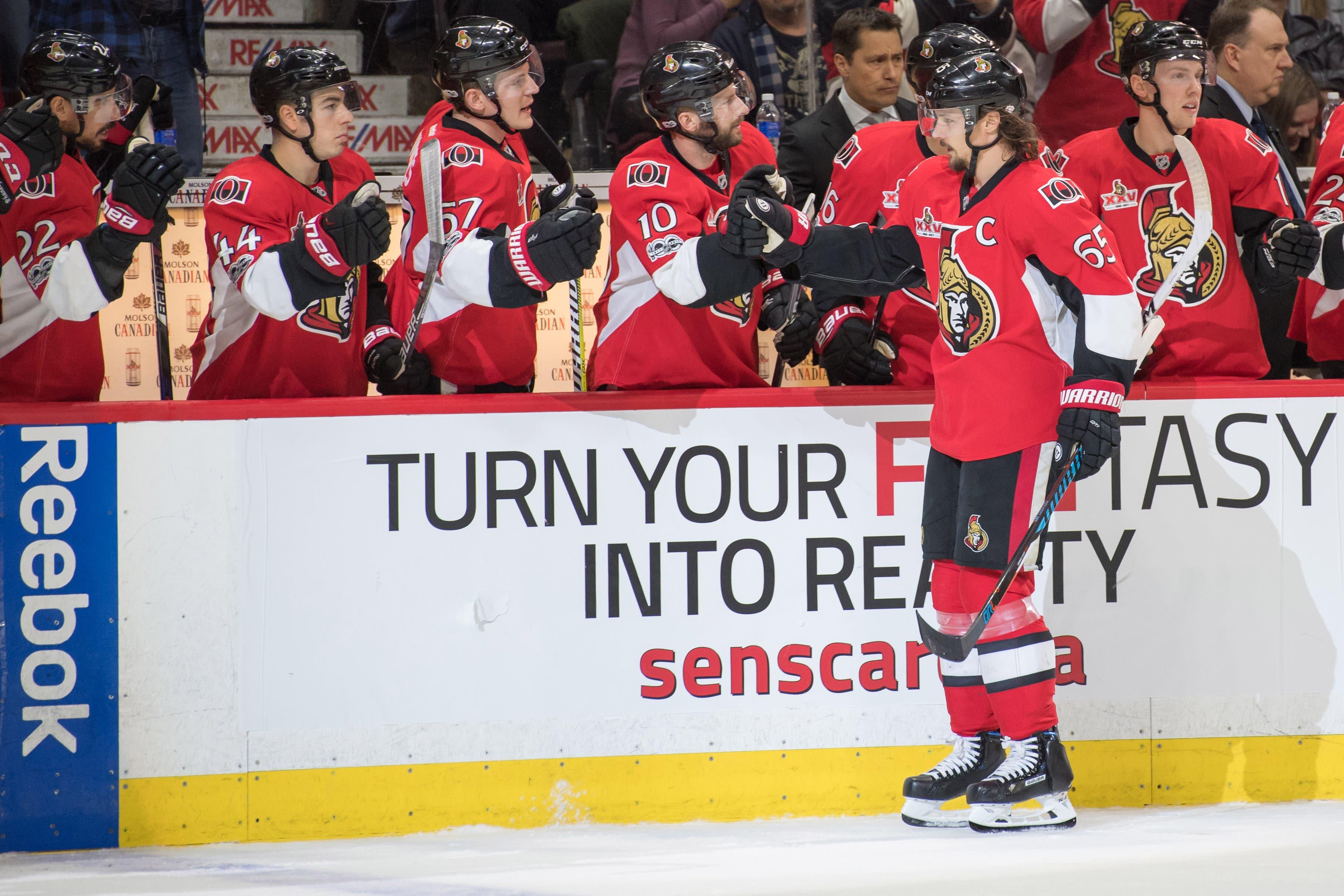 Apr 4, 2017; Ottawa, Ontario, CAN; The Ottawa Senators celebrate a goal by defenseman Erik Karlsson (65) in the first period against the Detroit Red Wings at Canadian Tire Centre. Mandatory Credit: Marc DesRosiers-USA TODAY Sports / Marc DesRosiers