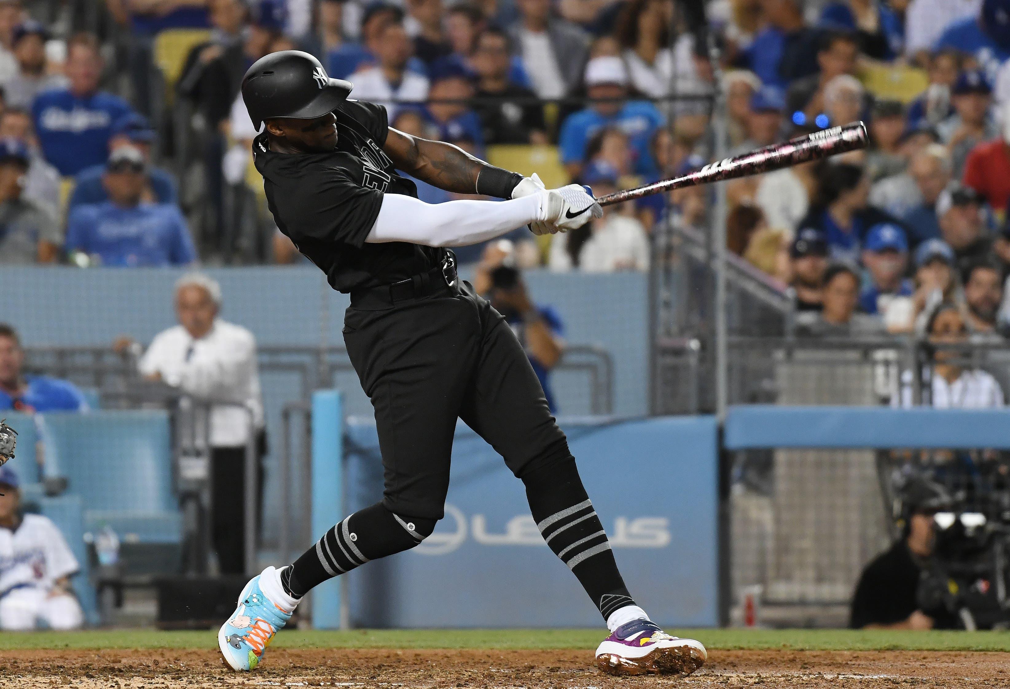 Aug 23, 2019; Los Angeles, CA, USA; New York Yankees left fielder Cameron Maybin (38) hits a double against the Los Angeles Dodgers in the fourth inning during an MLB Players' Weekend game at Dodger Stadium. Mandatory Credit: Richard Mackson-USA TODAY Sports / Richard Mackson