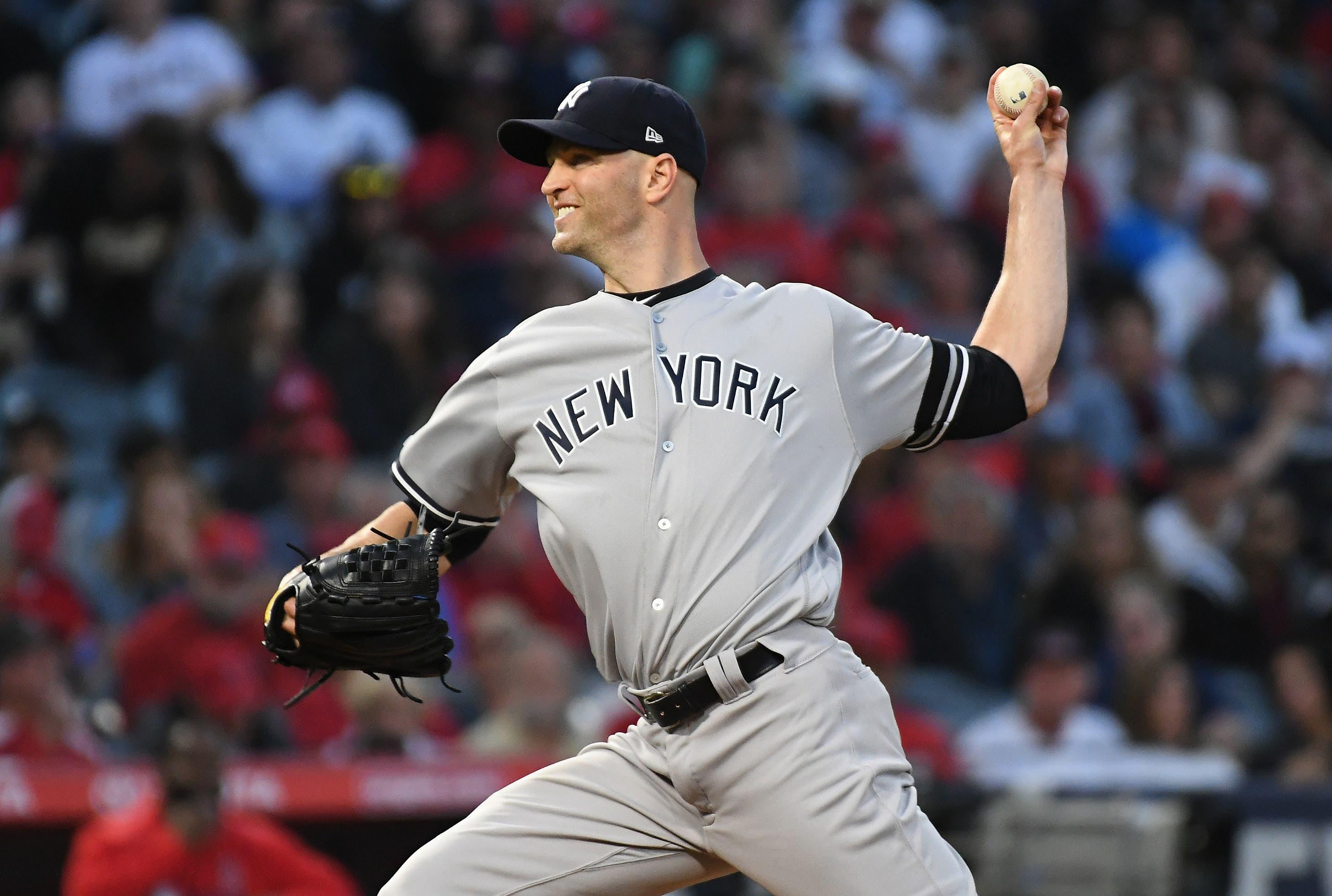 New York Yankees starting pitcher J.A. Happ pitches against the Los Angeles Angels in the first inning at Angel Stadium of Anaheim. / Richard Mackson/USA TODAY Sports