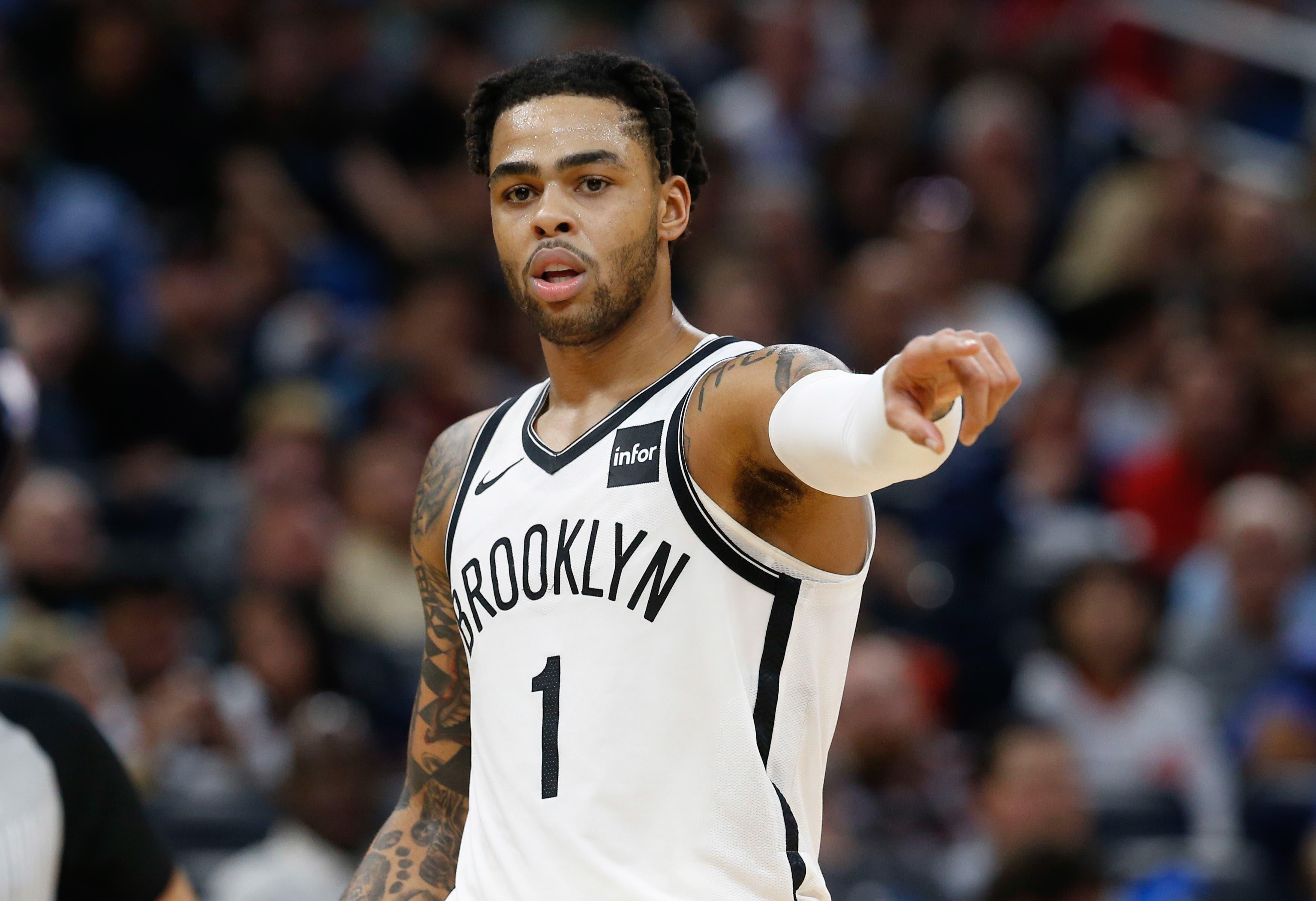 Jan 18, 2019; Orlando, FL, USA; Brooklyn Nets guard D'Angelo Russell (1) points during the second half at Amway Center. Mandatory Credit: Kim Klement-USA TODAY Sports / Kim Klement